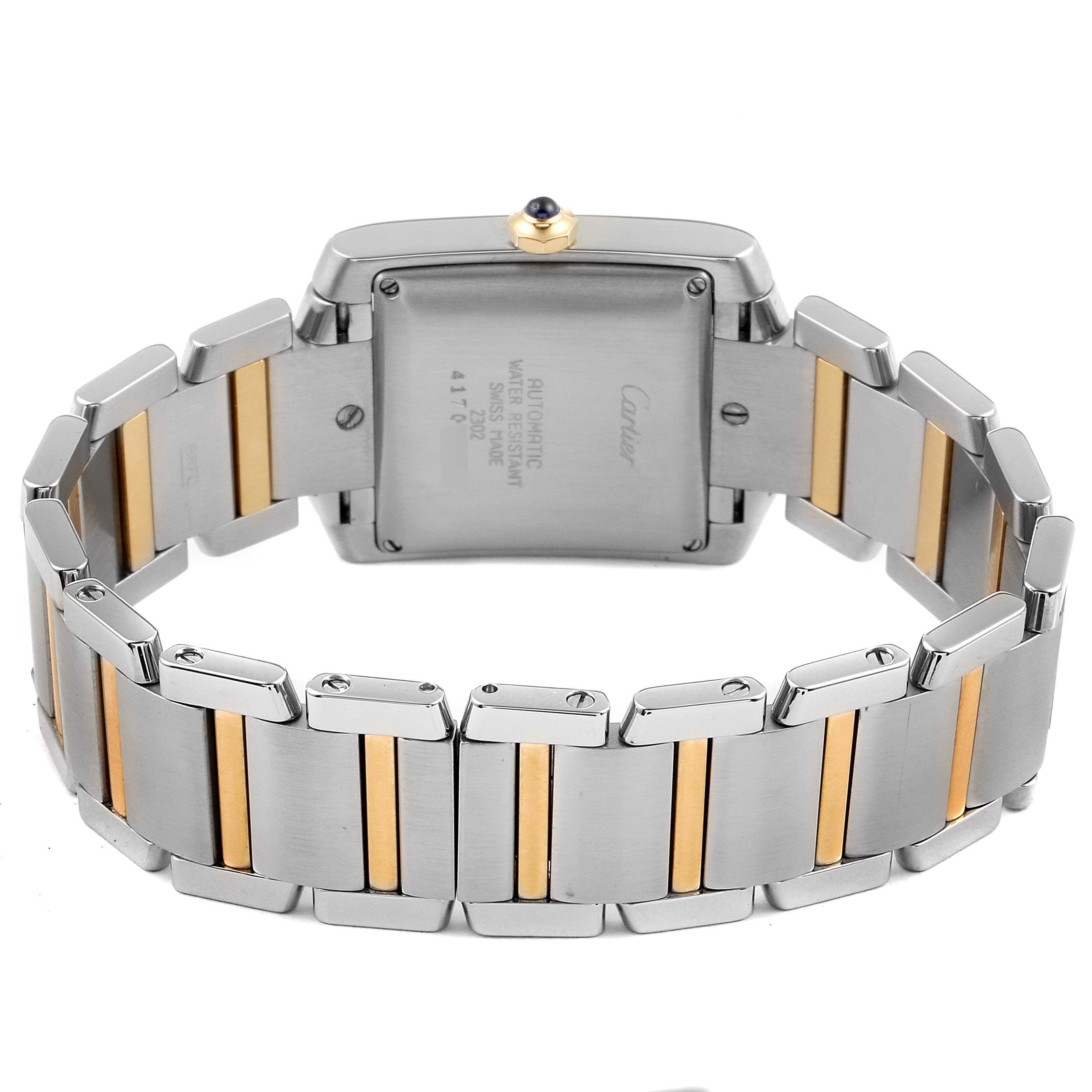The image shows a rear view of a Cartier Tank Francaise W51005Q4 Men's Steel and Gold (two tone) Silver Dial W51005Q4 Men's Steel and Gold (two tone) Silver Dial watch highlighting the bracelet and case back.