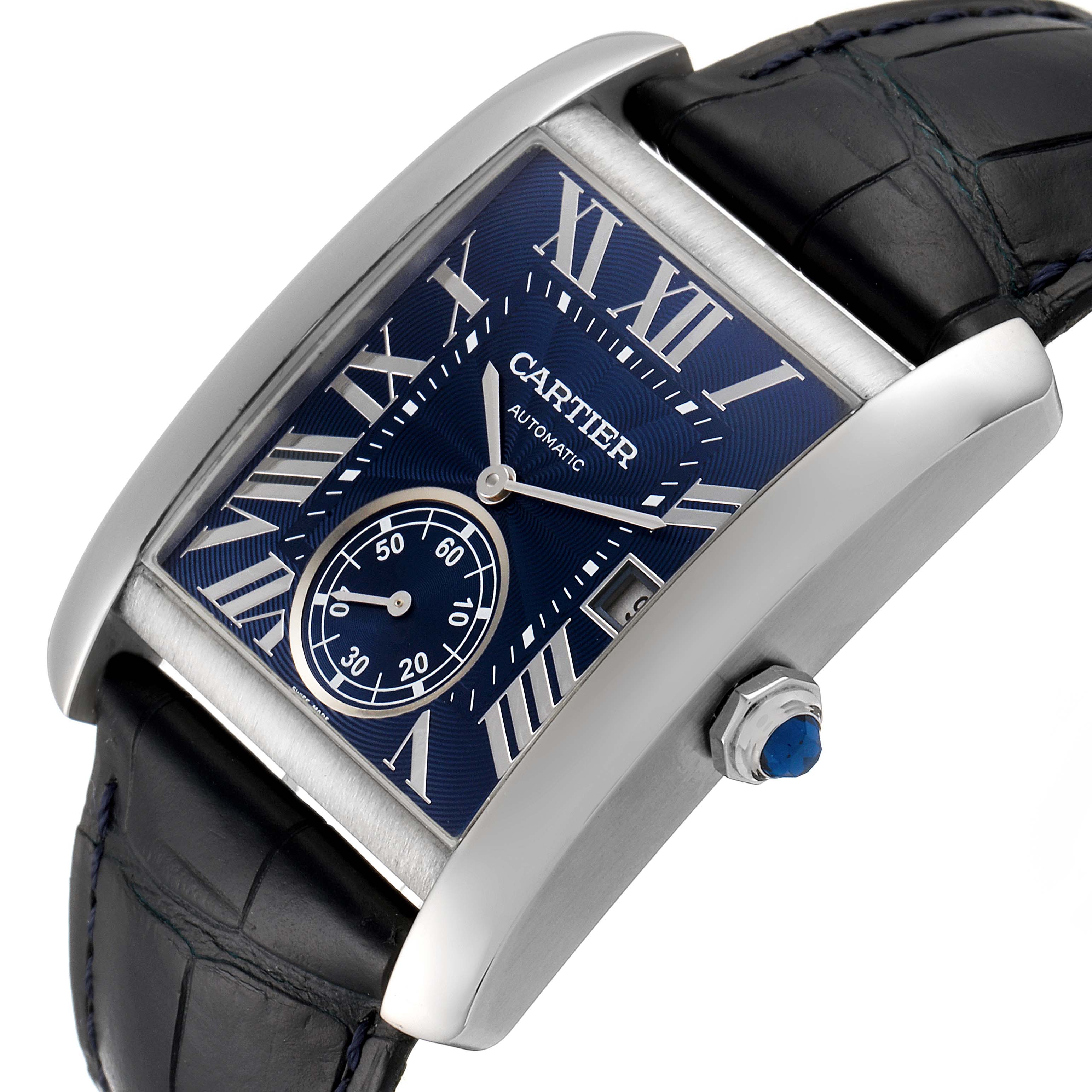 The image shows a Cartier Tank MC WSTA0010 Men's Stainless Steel Blue Dial WSTA0010 Men's Stainless Steel Blue Dial watch at an angled view highlighting its blue dial, Roman numerals, crown, and leather strap.
