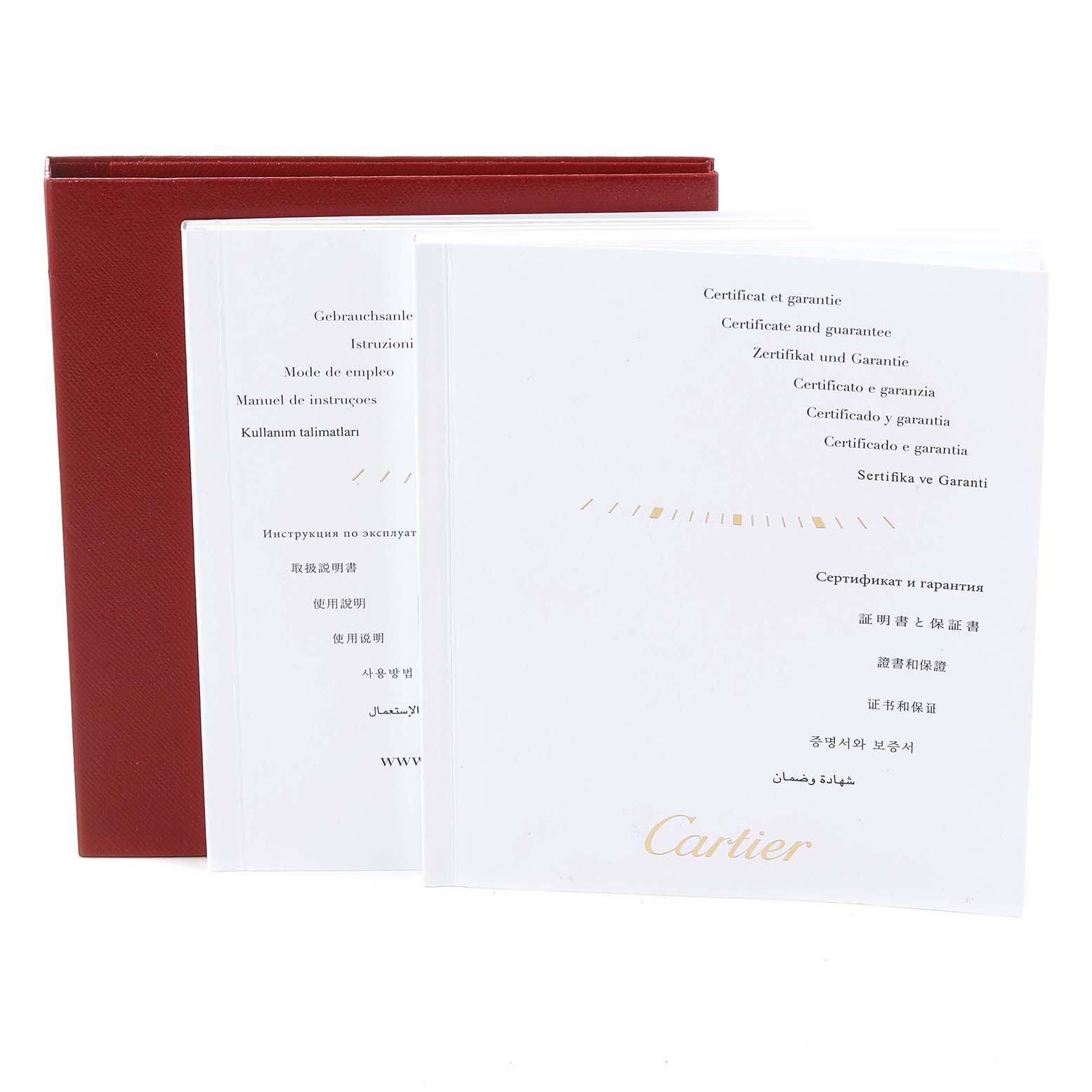 This image shows the warranty and instruction manuals for the Cartier Tank Solo W5200014 Men's Stainless Steel Silver Dial W5200014 Men's Stainless Steel Silver Dial watch, with a red cover visible.