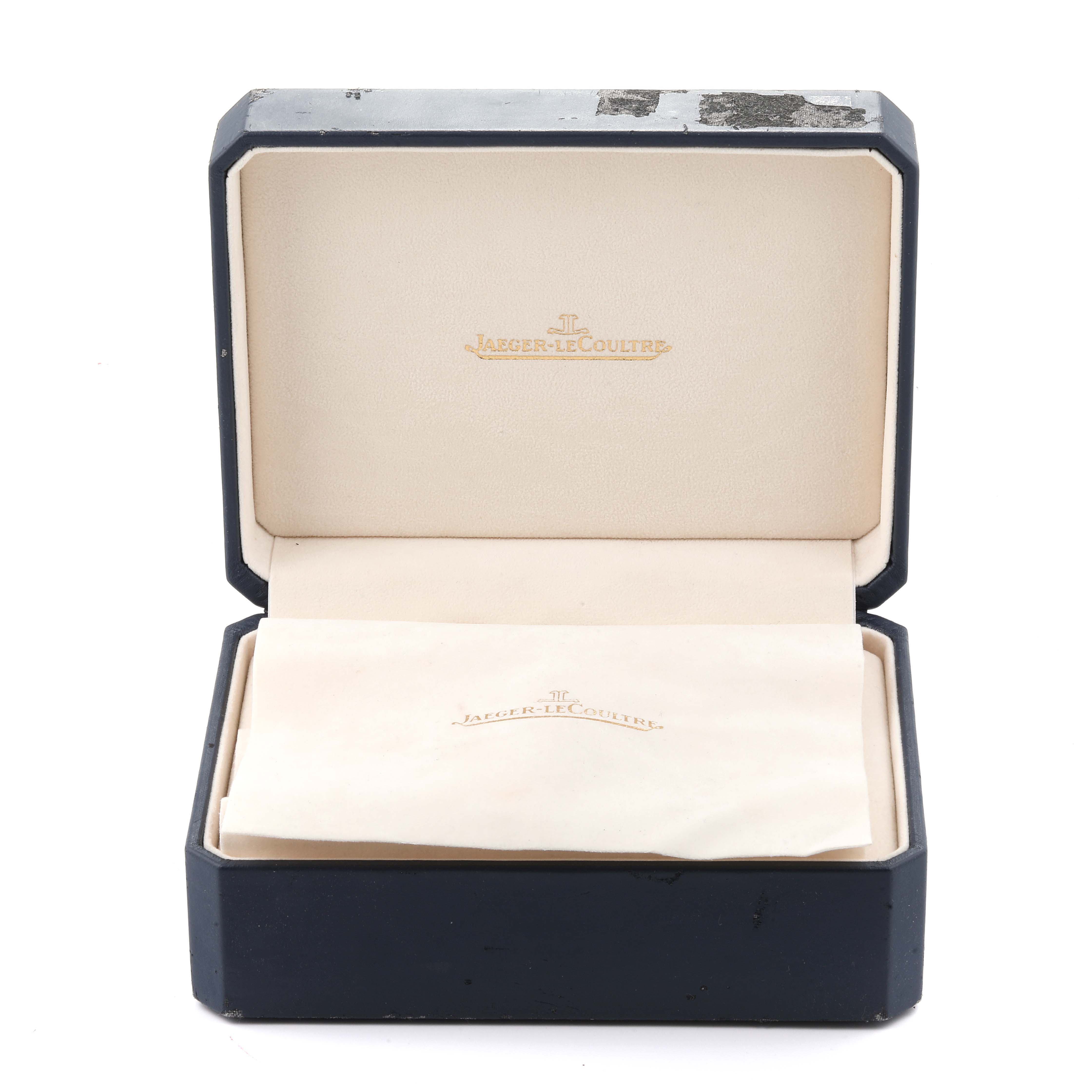 The image shows an open Jaeger-LeCoultre Reverso watch box, viewed from the front, including the interior branding.