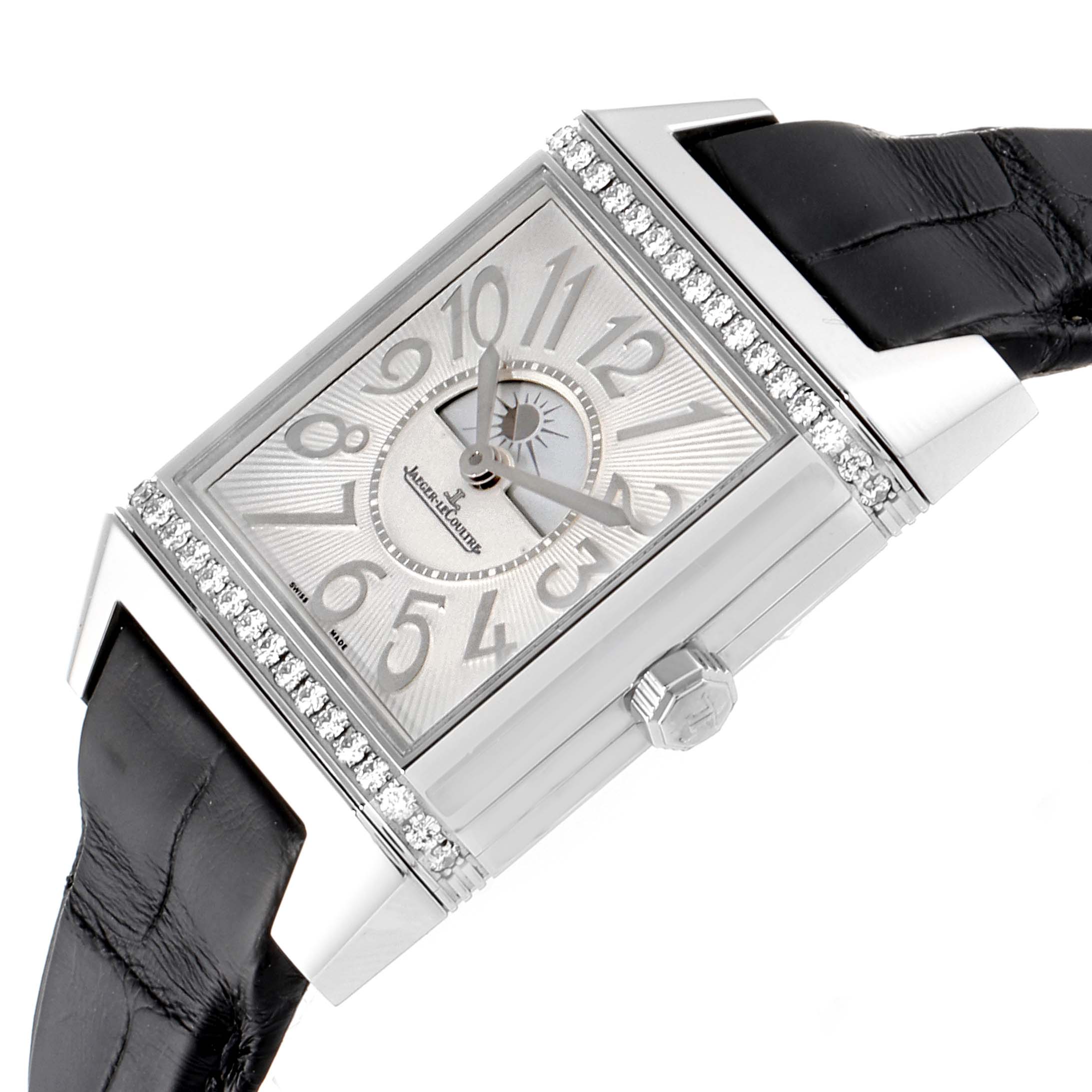 The image shows a close-up, angled view of a Jaeger LeCoultre Reverso Q7058430  Women's Stainless Steel Silver Dial Q7058430  Women's Stainless Steel Silver Dial watch, highlighting its face, dial, crown, and part of the strap.