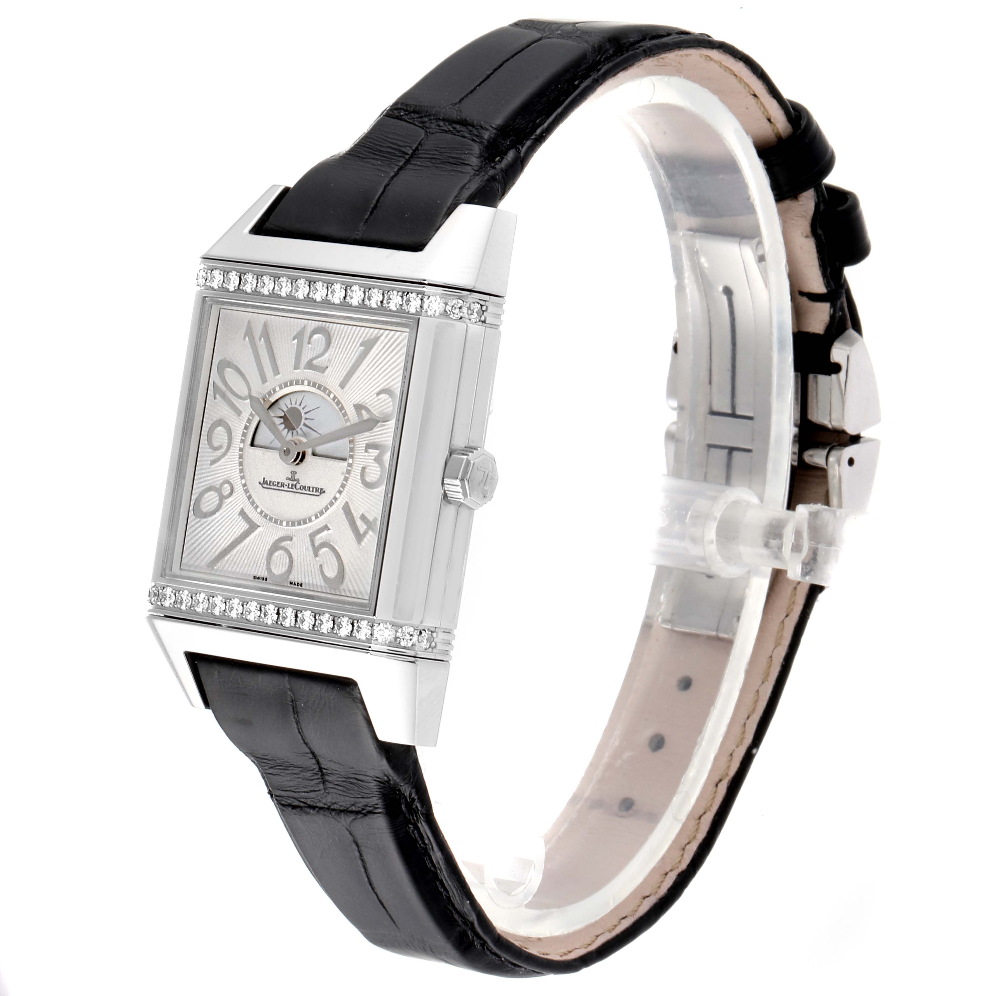 The Jaeger LeCoultre Reverso Q7058430  Women's Stainless Steel Silver Dial Q7058430  Women's Stainless Steel Silver Dial model watch is shown at a slight angle, displaying its face, side crown, and a portion of the black leather strap.