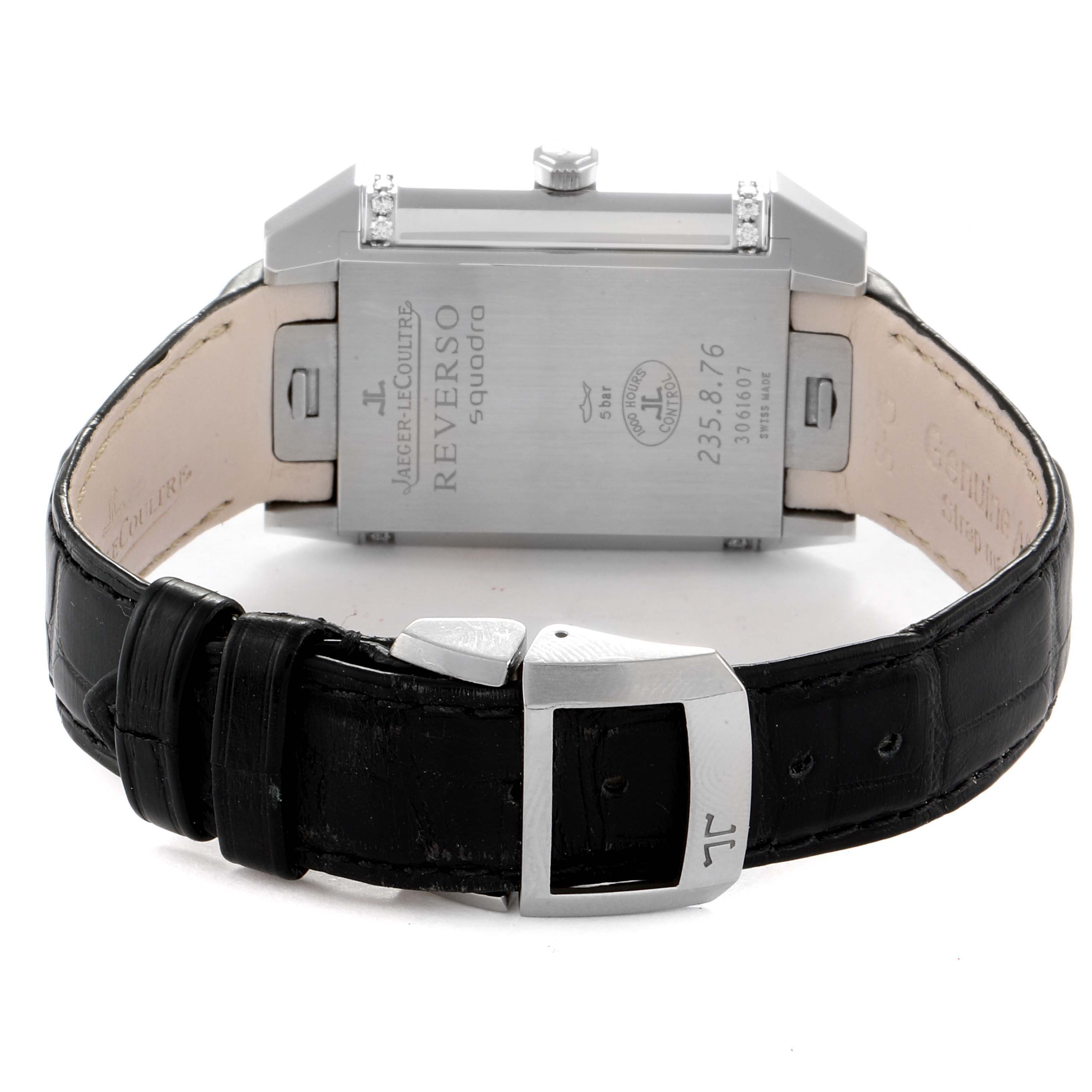 The image shows the back and clasp of a Jaeger LeCoultre Reverso Q7058430  Women's Stainless Steel Silver Dial Q7058430  Women's Stainless Steel Silver Dial watch with a black leather strap.