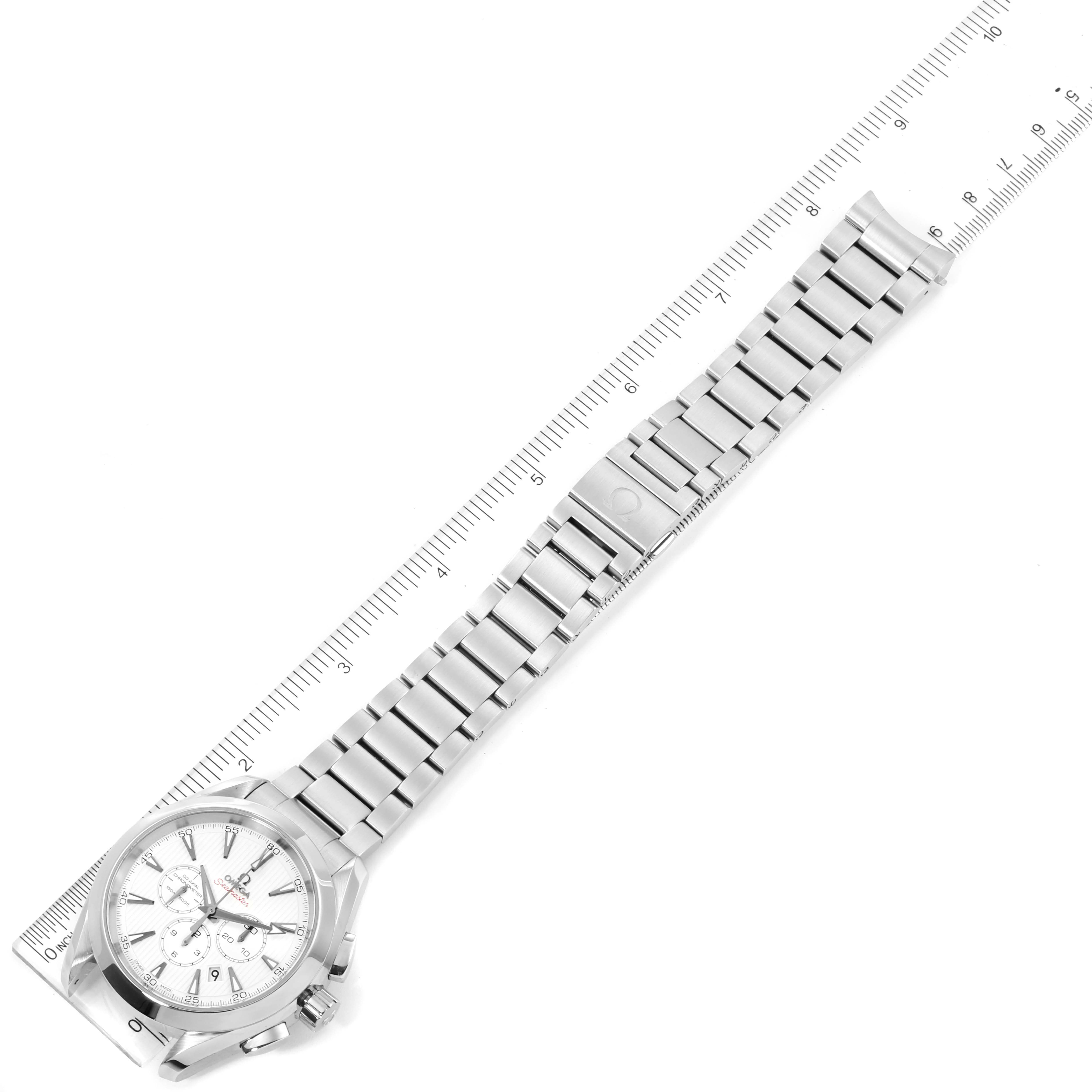 The image shows an Omega Aqua Terra 231.10.44.50.04.001 Men
s Stainless Steel White Dial 231.10.44.50.04.001 Men
s Stainless Steel White Dial watch laid flat with a ruler alongside, highlighting the full bracelet length.