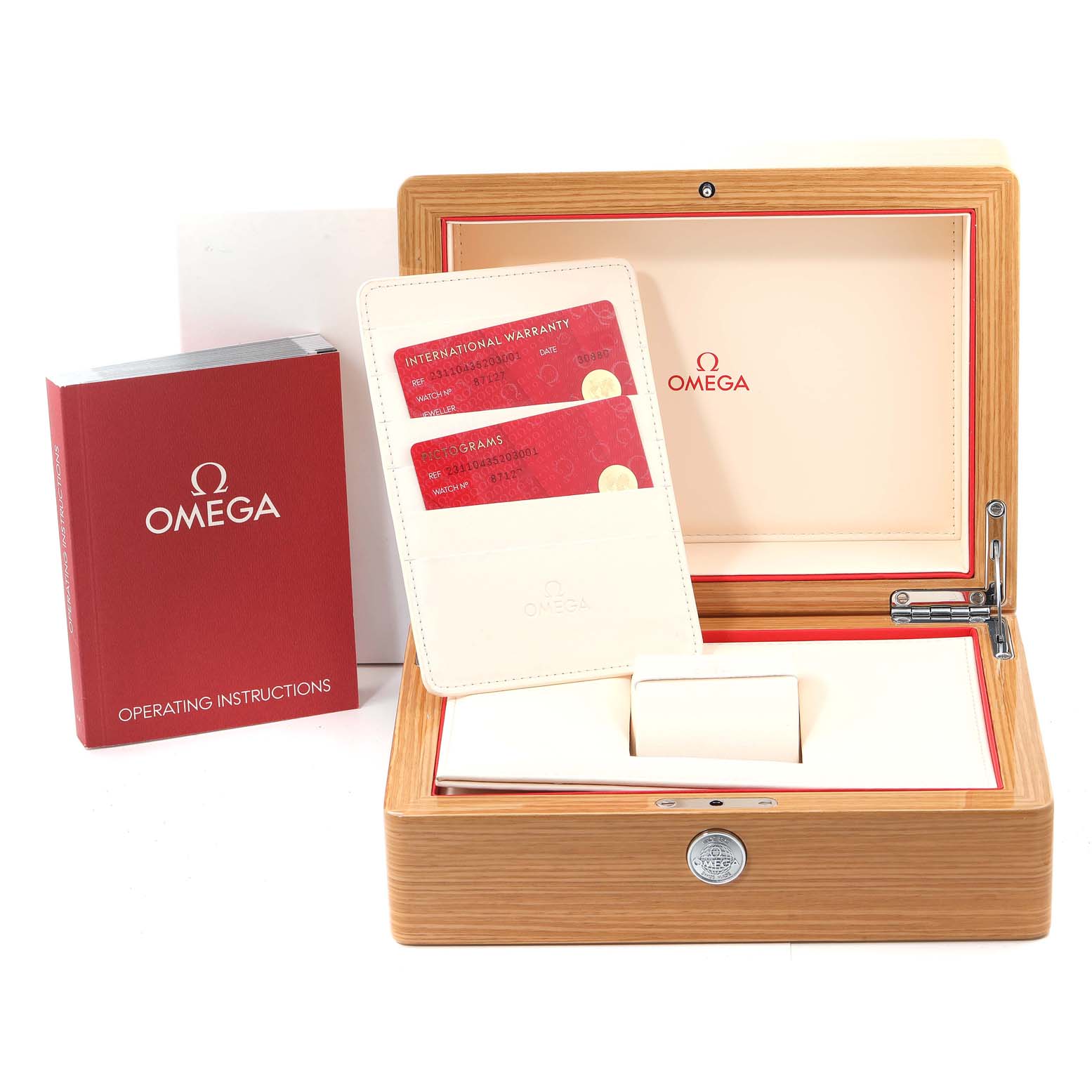 The image shows the packaging and accessories of an Omega Aqua Terra 231.10.43.52.03.001 Men
s Stainless Steel Blue Dial 231.10.43.52.03.001 Men
s Stainless Steel Blue Dial watch, including a wooden box, warranty cards, and an instruction manual.