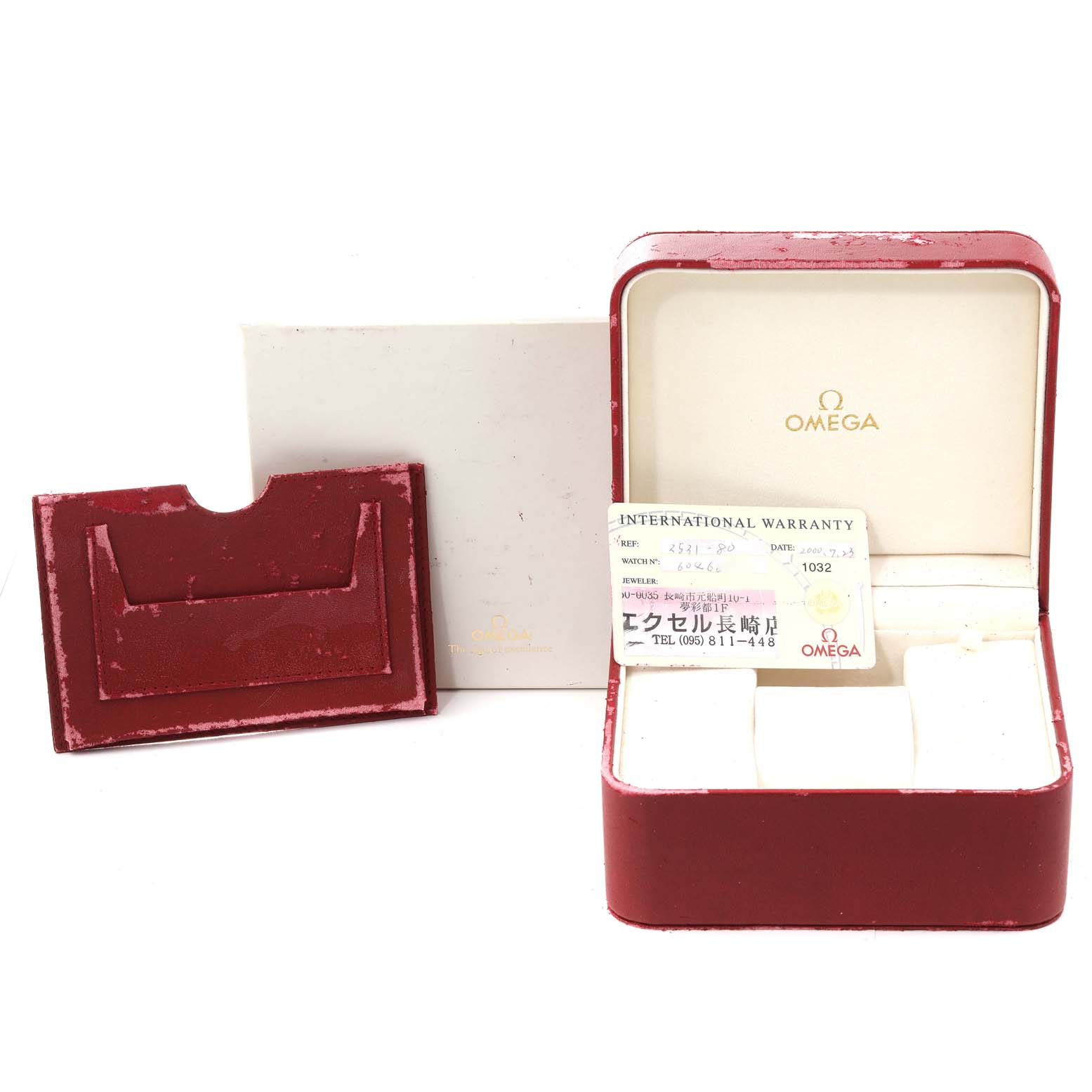 The image shows the packaging for an Omega Seamaster 2531.80.00 Men's Stainless Steel Blue Dial 2531.80.00 Men's Stainless Steel Blue Dial watch, including its case, warranty card, and cardholder.