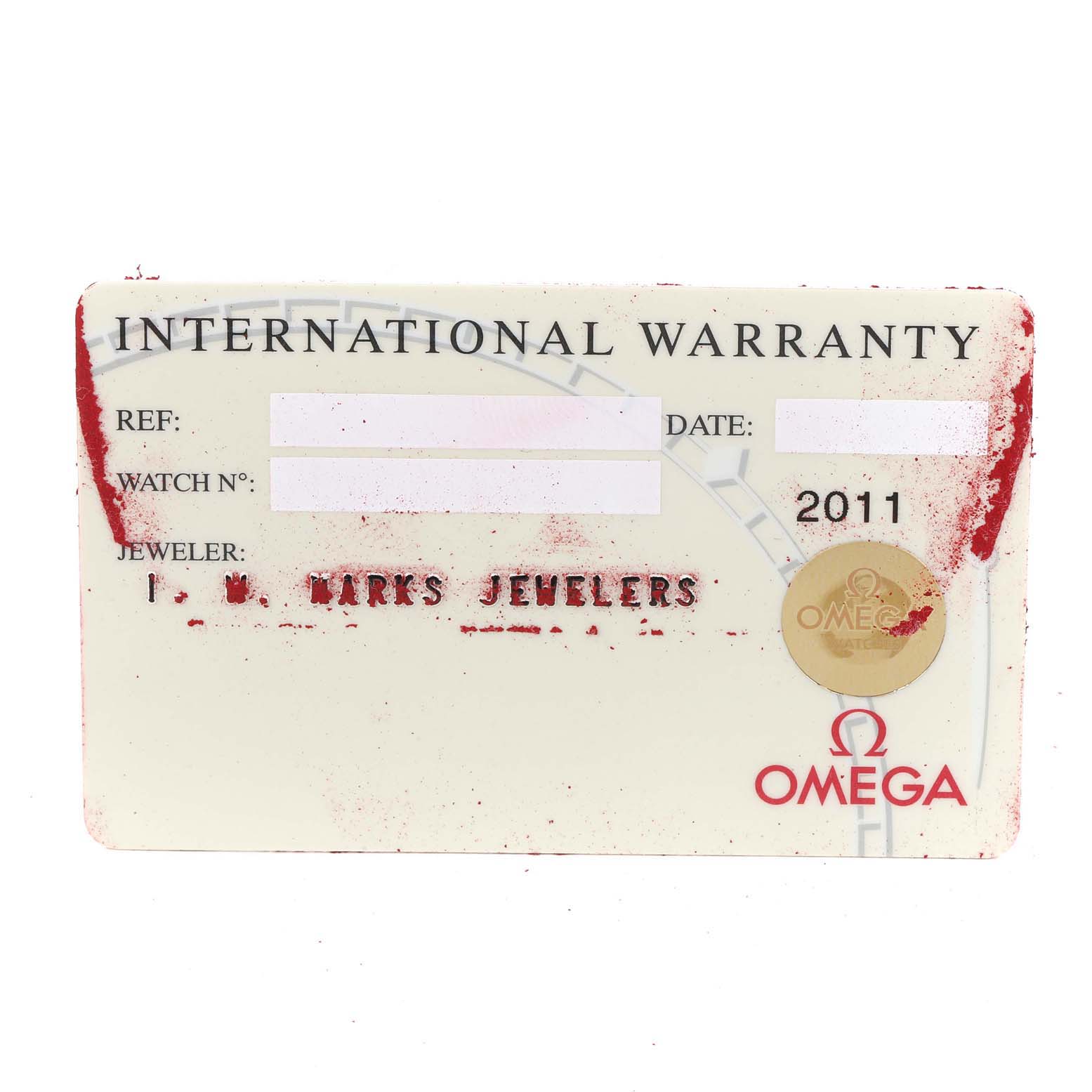 This image shows the international warranty card for an Omega Seamaster 2552.80.00 Men's Stainless Steel Blue Dial 2552.80.00 Men's Stainless Steel Blue Dial watch, with dealer information and a 2011 date.