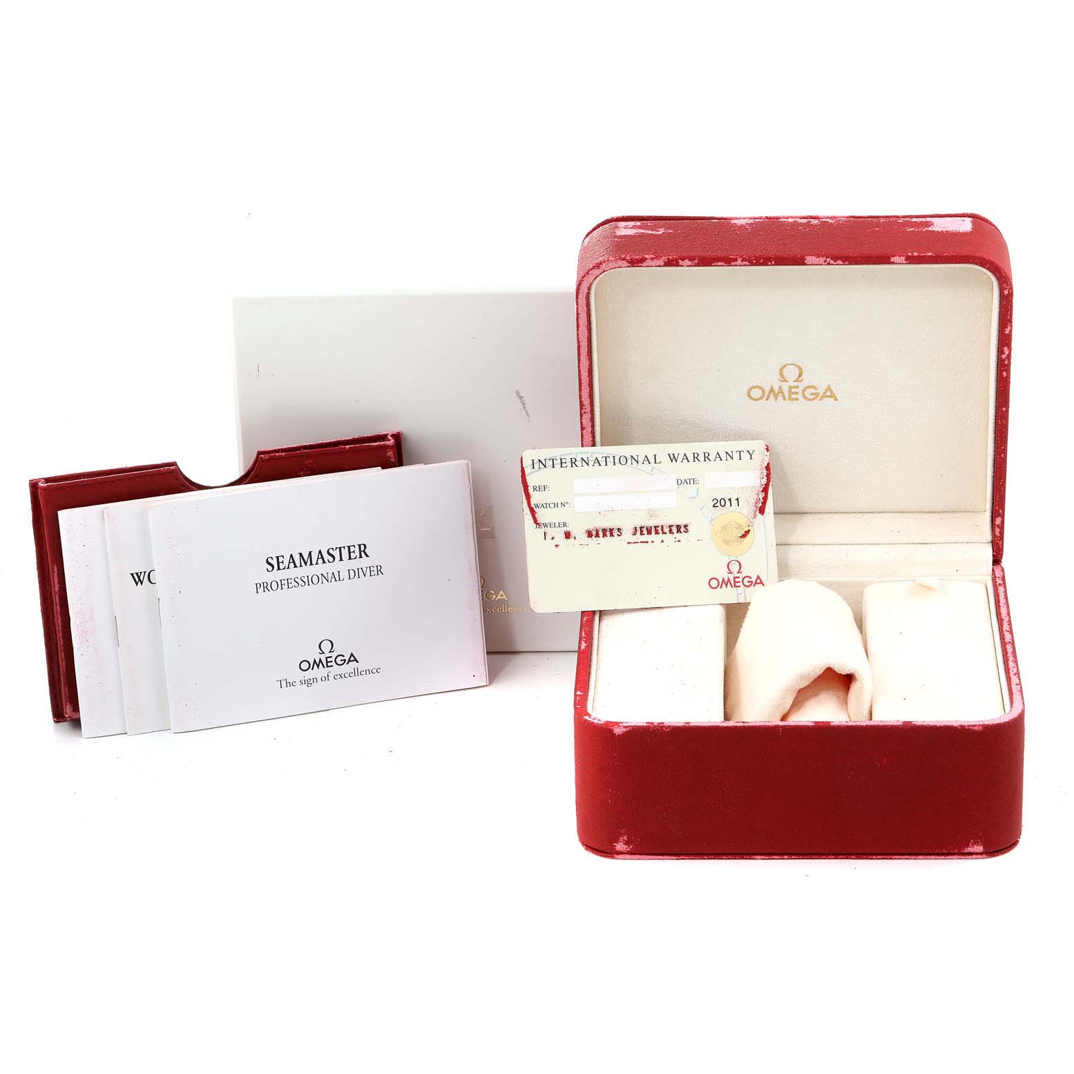 The image shows the box, warranty card, and instruction manuals for the Omega Seamaster 2552.80.00 Men's Stainless Steel Blue Dial 2552.80.00 Men's Stainless Steel Blue Dial watch.