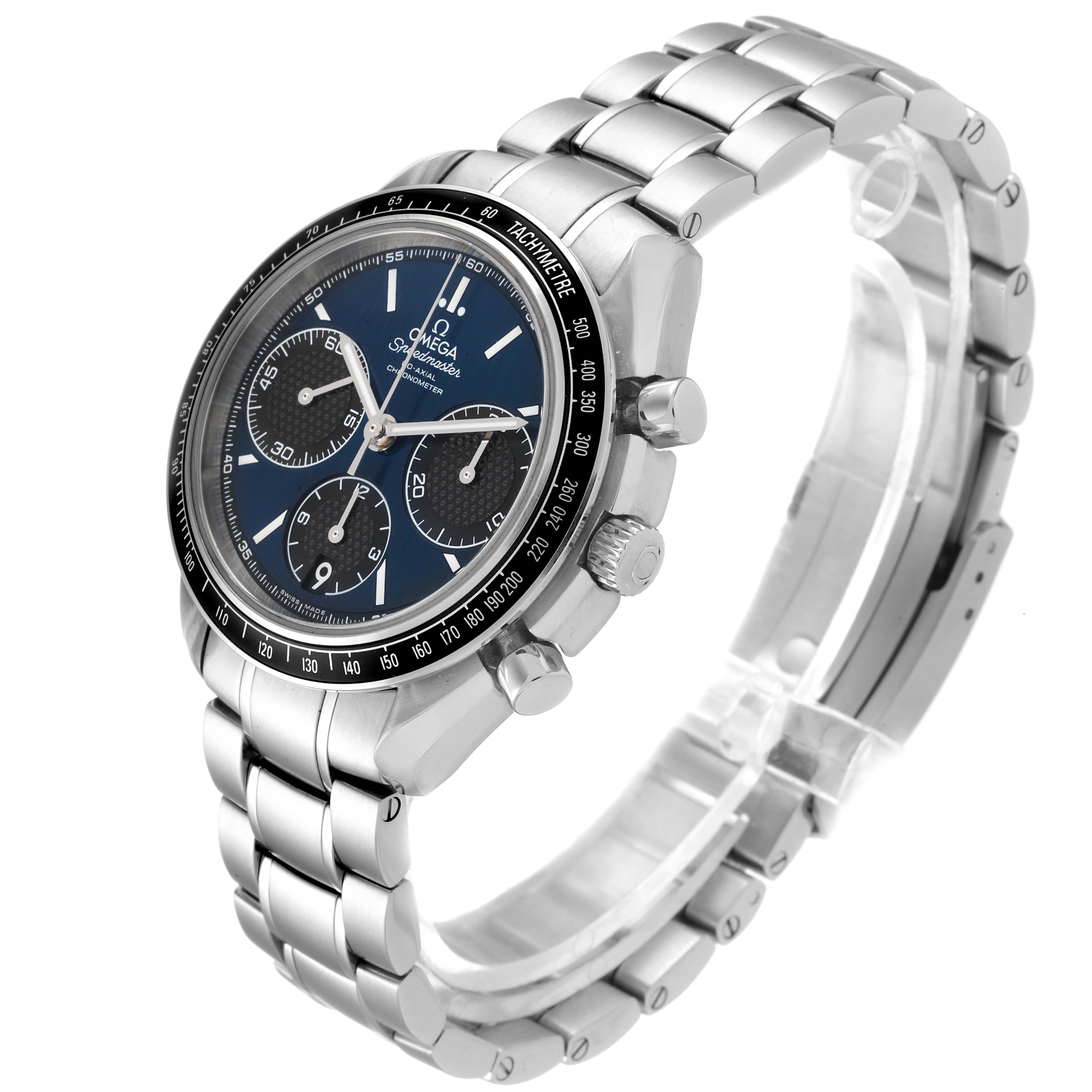 The image shows a side angle of an Omega Speedmaster 326.30.40.50.03.001 Men
s Stainless Steel Blue Dial 326.30.40.50.03.001 Men
s Stainless Steel Blue Dial watch, highlighting the dial, bezel, crown, pushers, and metal bracelet.