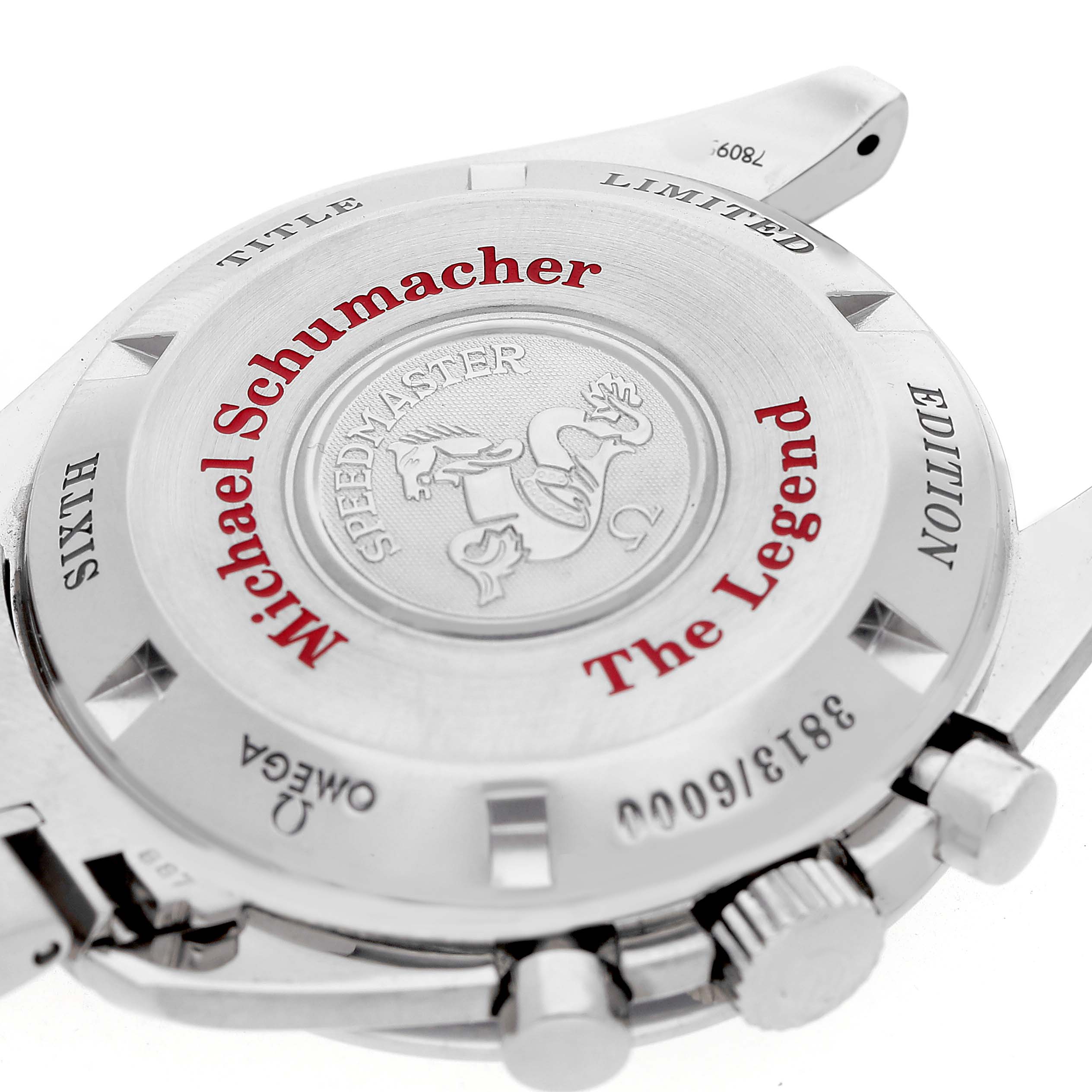 The image shows the back of an Omega Speedmaster 3559.32.00 Men's Stainless Steel White Dial watch, highlighting the limited edition engravings.