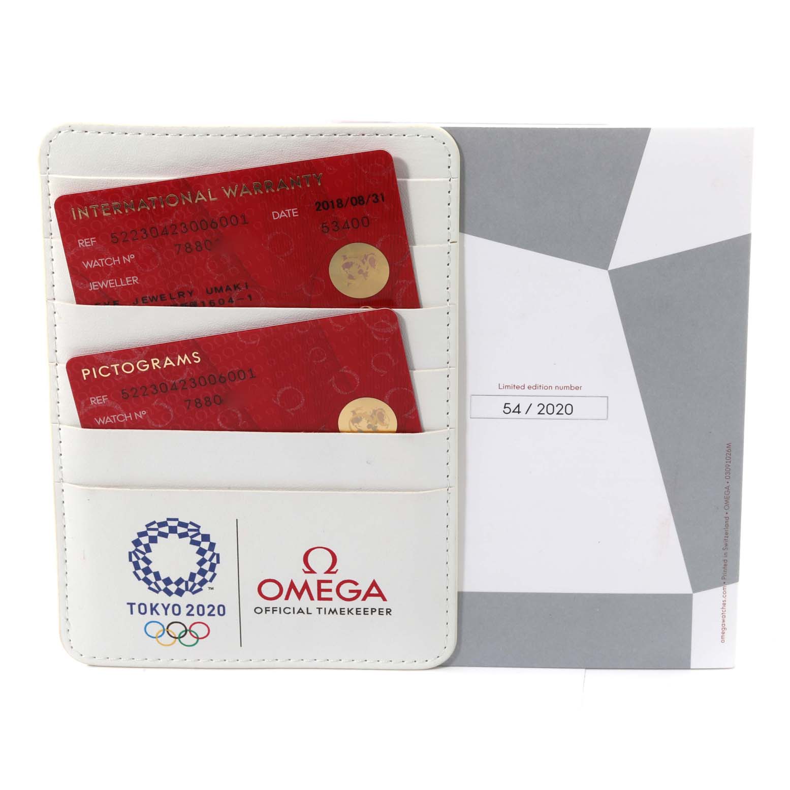 The image shows warranty and pictogram cards along with a limited edition certificate for the Omega Speedmaster 522.30.42.30.06.001 Men
s Stainless Steel Silver Dial 522.30.42.30.06.001 Men
s Stainless Steel Silver Dial watch.