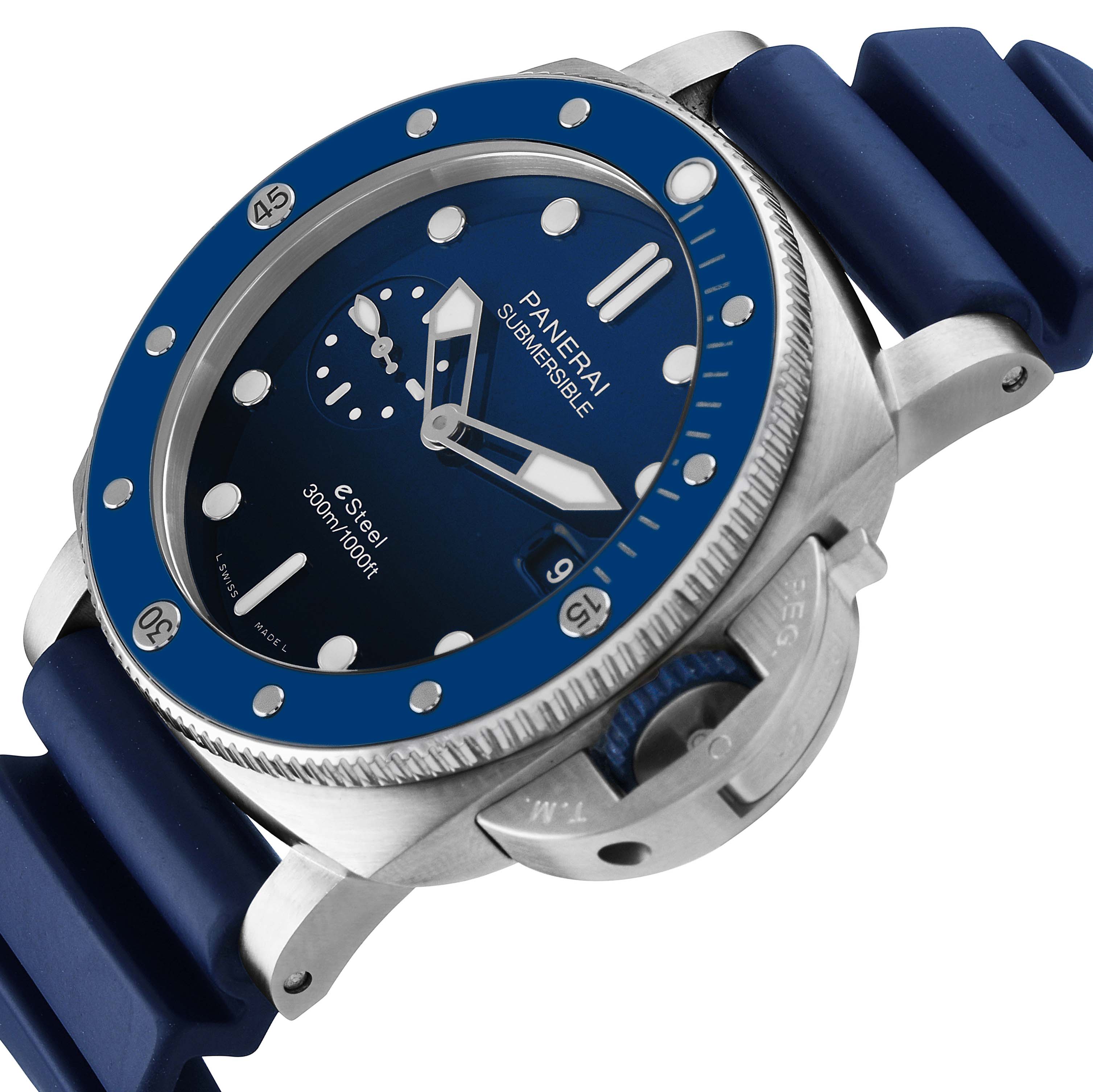 The Panerai Submersible PAM01289 Men's Stainless Steel Blue Dial watch is shown at an angled view, highlighting the bezel, dial, and crown guard, with a blue strap.