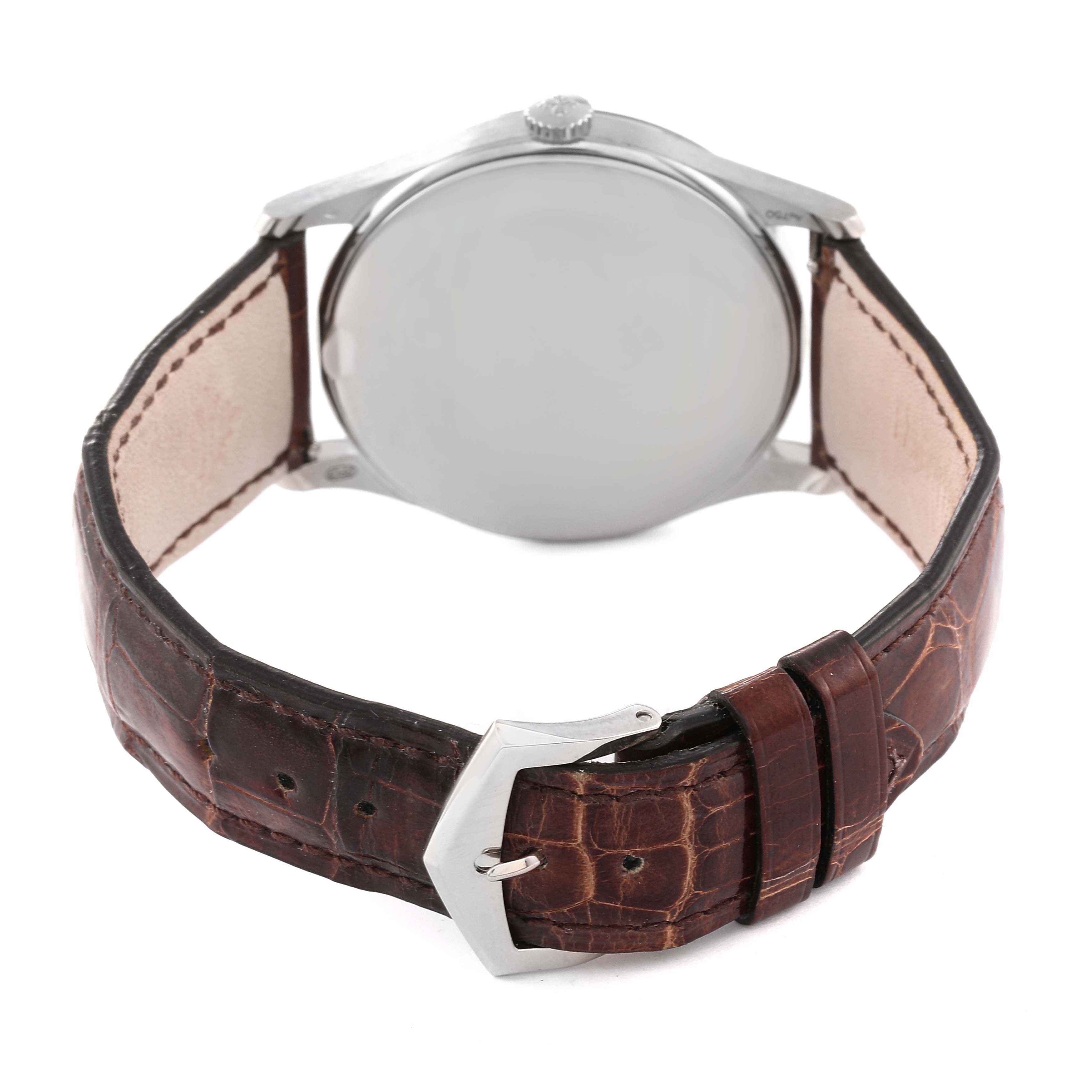 The image shows the back view of a Patek Philippe Calatrava 5196G Men
s White Gold Silver Dial 5196G Men
s White Gold Silver Dial watch, highlighting its leather strap and clasp.