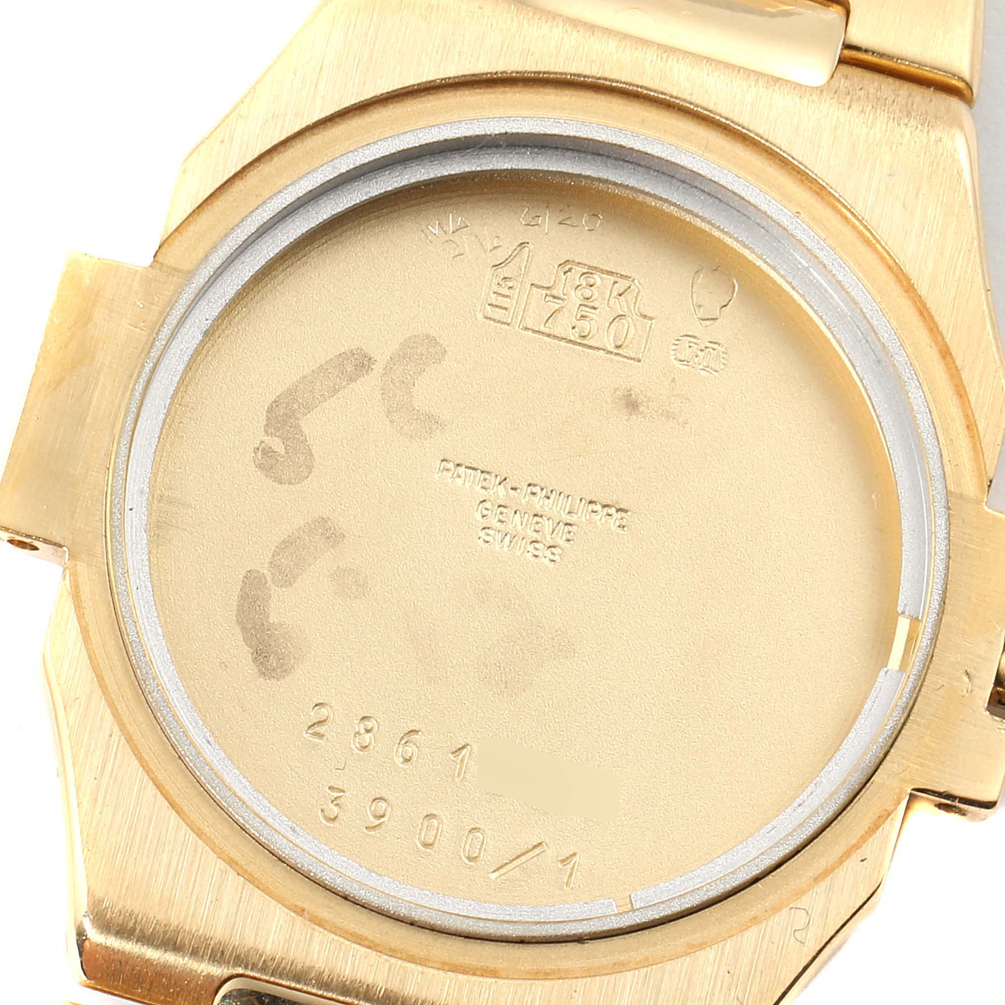 This image shows the case back of a Patek Philippe Nautilus 3900/1J Women's Yellow Gold Champagne Dial 3900/1J Women's Yellow Gold Champagne Dial model watch from an inside angle.