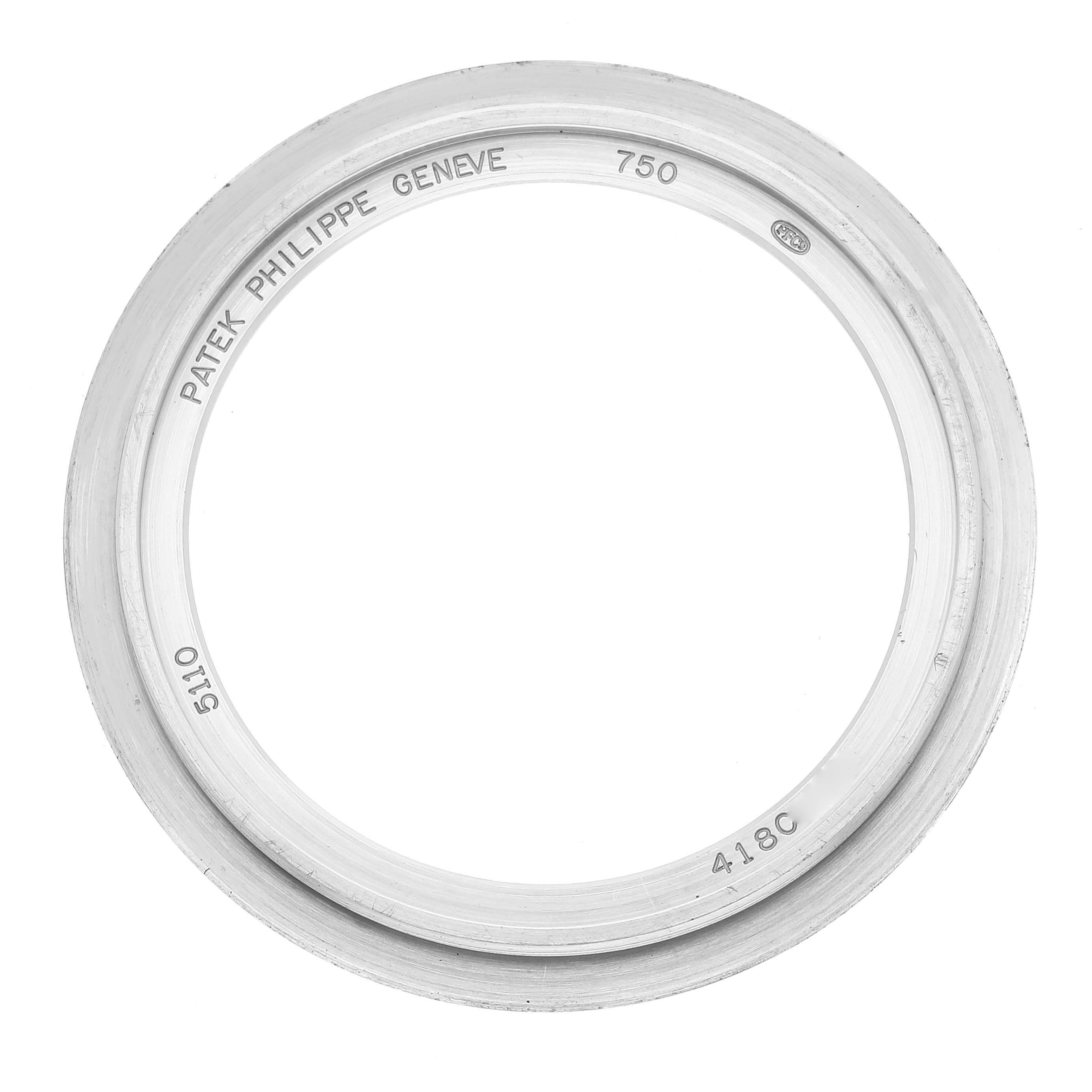 The image shows a top view of a bezel for a Patek Philippe Complications 5110G Men's White Gold Silver Dial 5110G Men's White Gold Silver Dial model 5110 watch.
