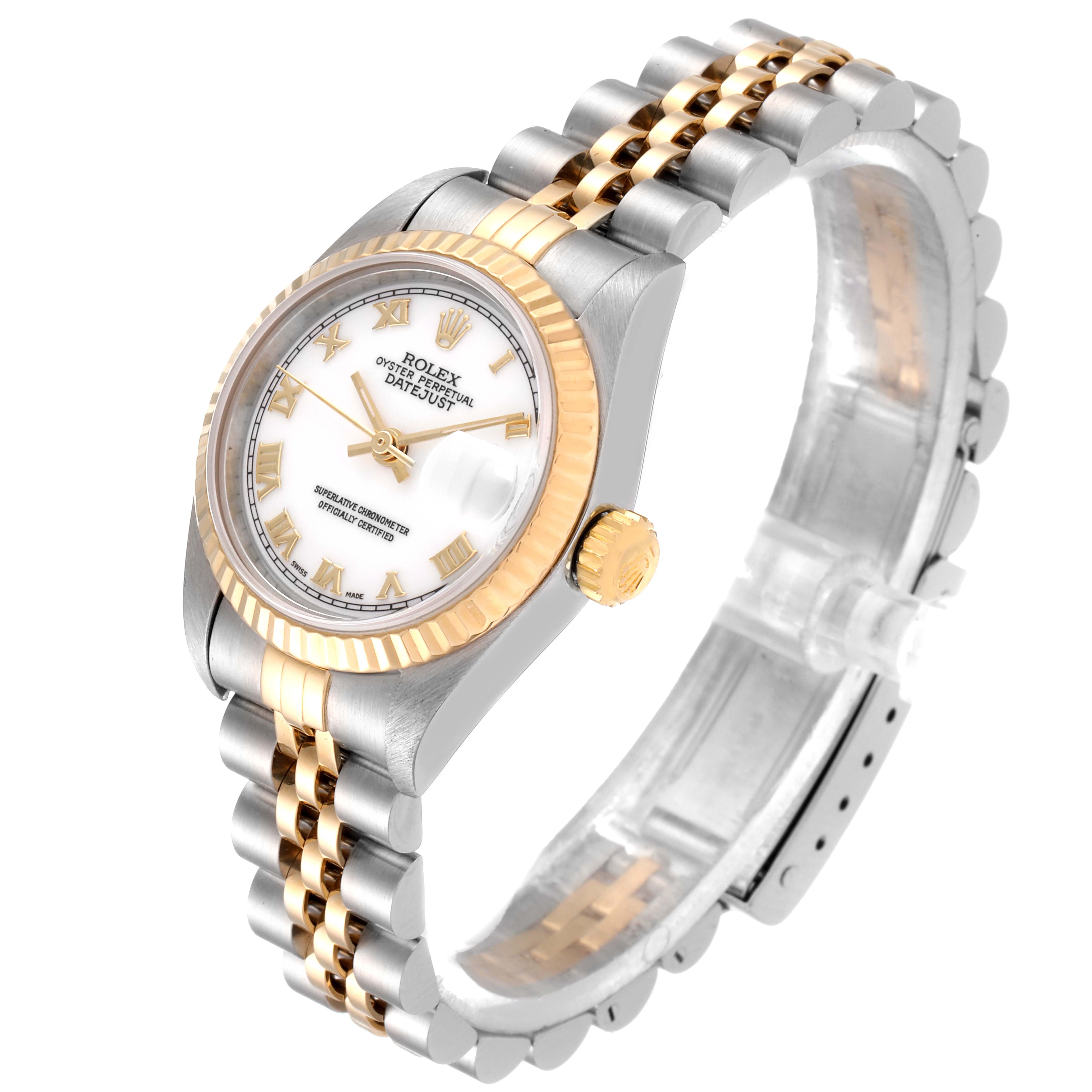 This image shows a Rolex Datejust 79173 Women's Steel and Gold (two tone) White Dial 79173 Women's Steel and Gold (two tone) White Dial watch at a slight angle, highlighting its dial, bezel, crown, and two-tone bracelet.