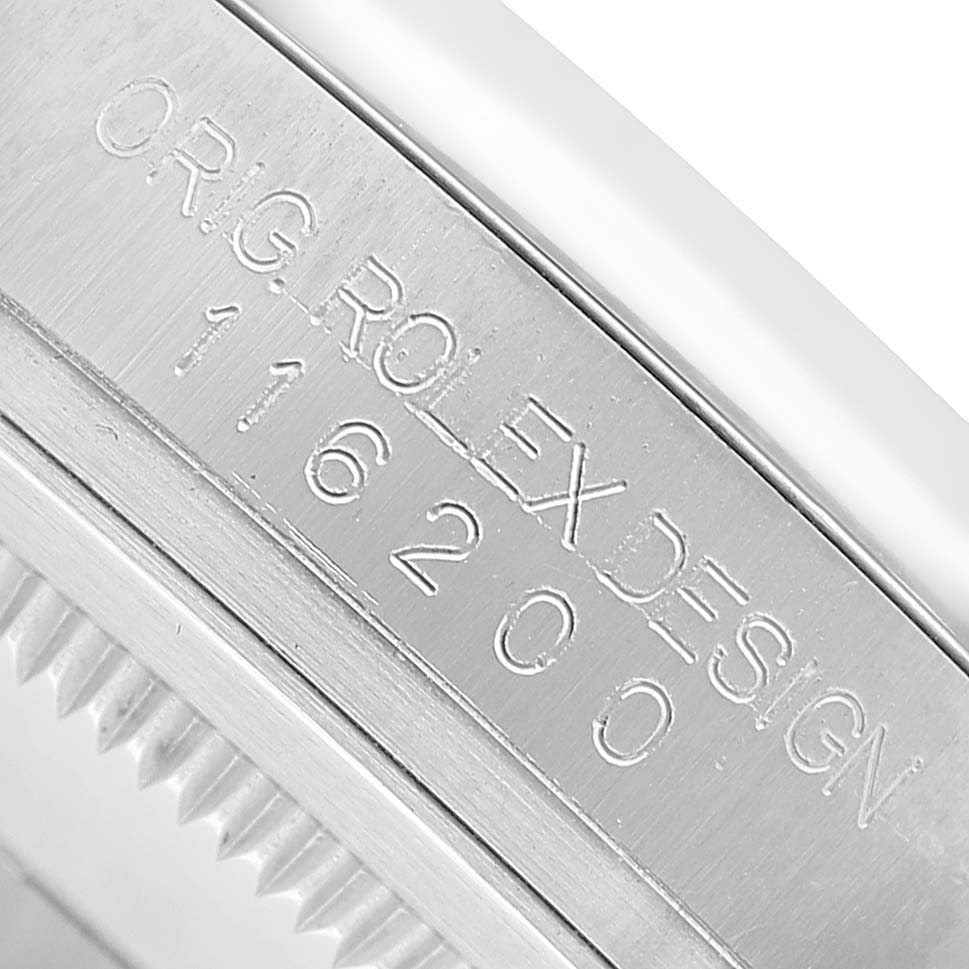 The image shows the side view of a Rolex Datejust 116200 Men's Stainless Steel White Dial, focusing on the engraved bezel with model information.