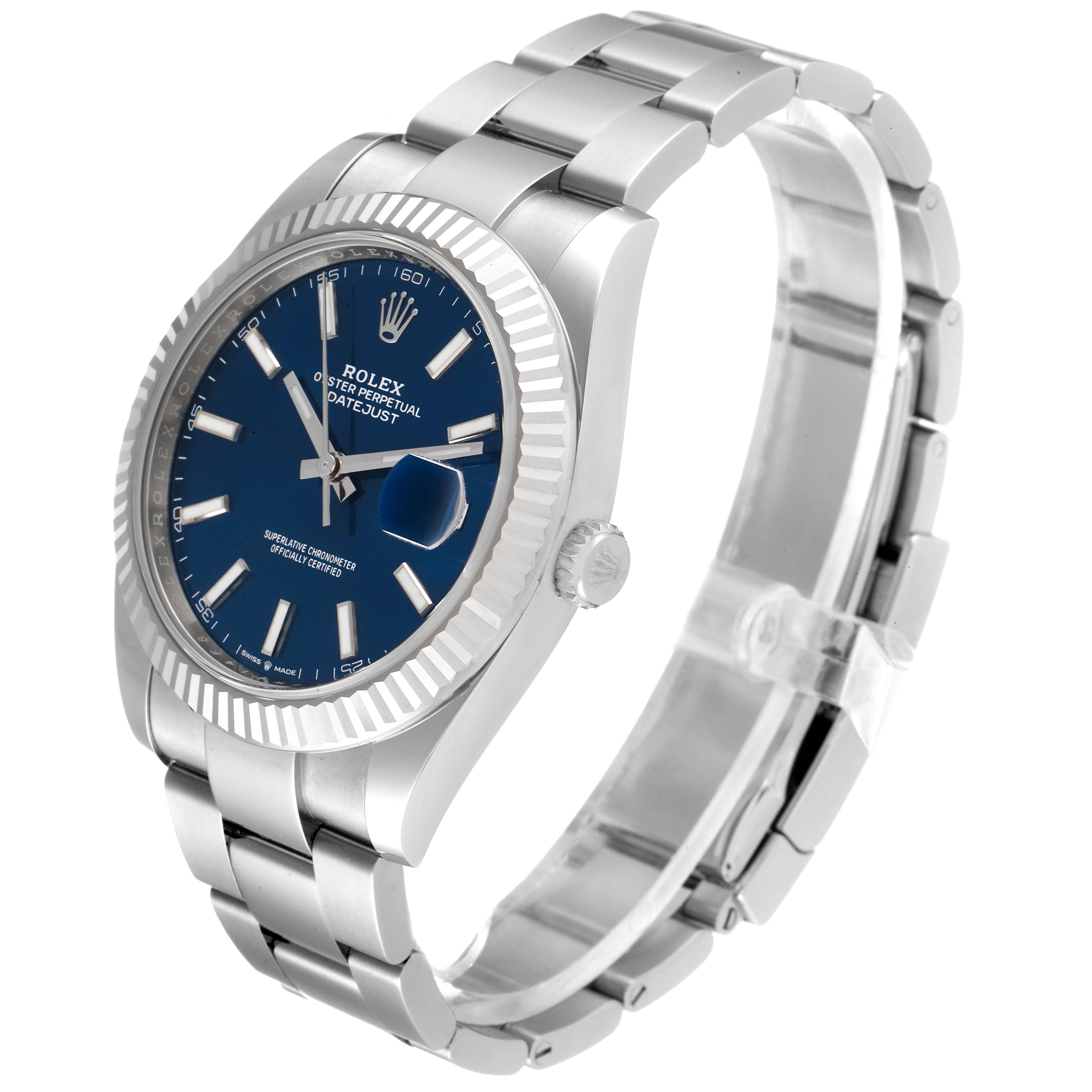 The image shows a Rolex Datejust 41 126334 Men
s Stainless Steel Blue Dial 126334 Men
s Stainless Steel Blue Dial watch at a three-quarter angle, highlighting its blue dial, fluted bezel, and stainless steel bracelet.