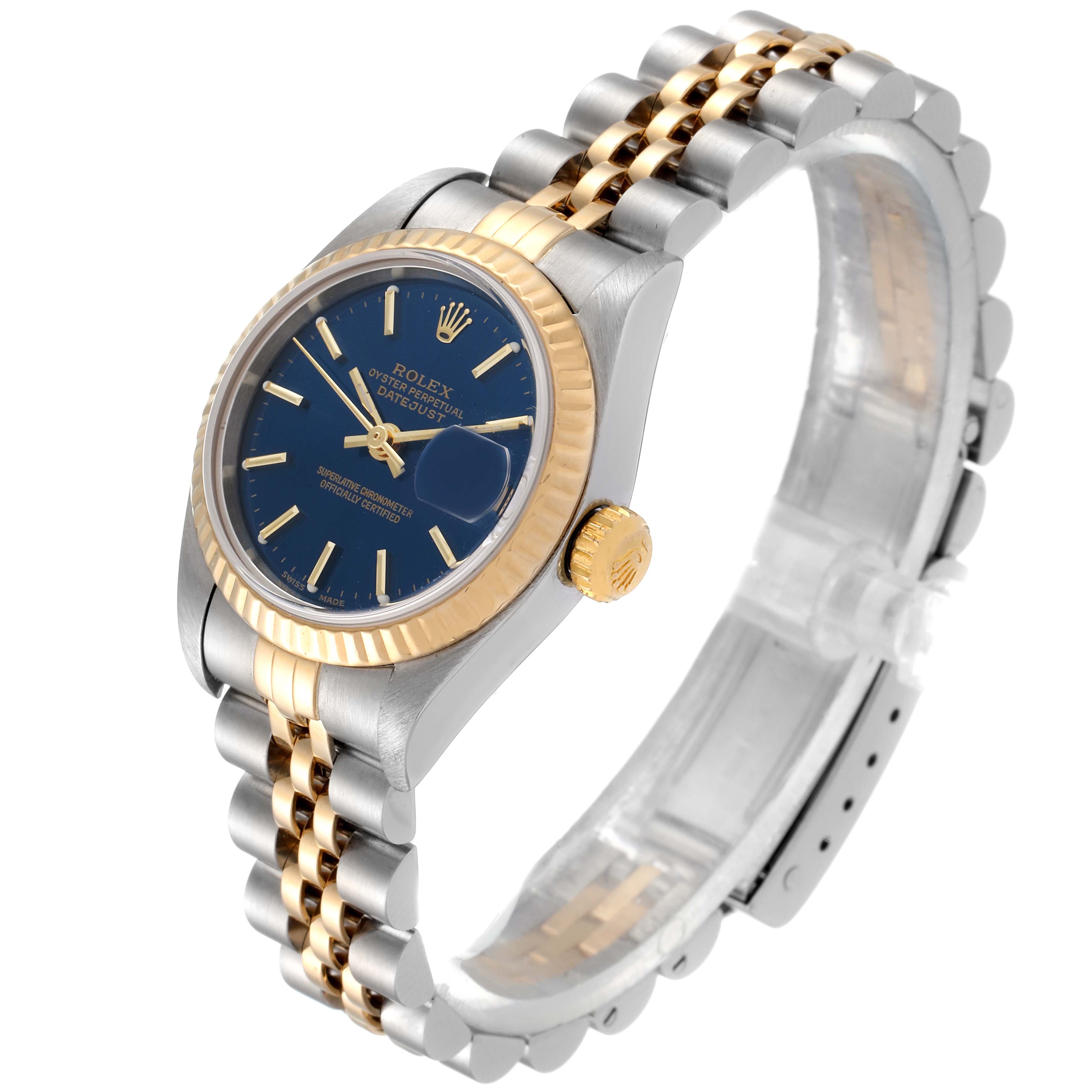 The Rolex Datejust 79173 Women's Steel and Gold (two tone) Blue Dial 79173 Women's Steel and Gold (two tone) Blue Dial watch is shown at an angle displaying its face, fluted bezel, crown, and jubilee bracelet.