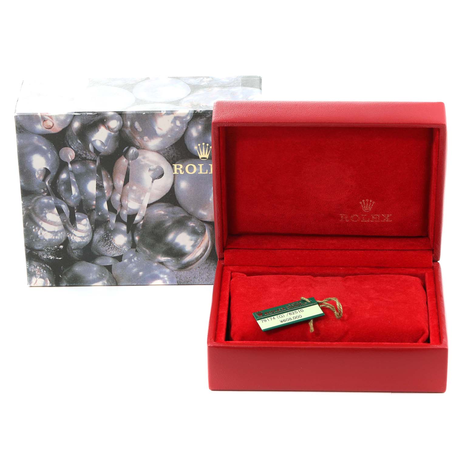 The image shows a Rolex Datejust 79174 Women's Stainless Steel Pink Dial 79174 Women's Stainless Steel Pink Dial box set with a red watch box and decorative outer box, open to reveal a red interior cushion and a tag.