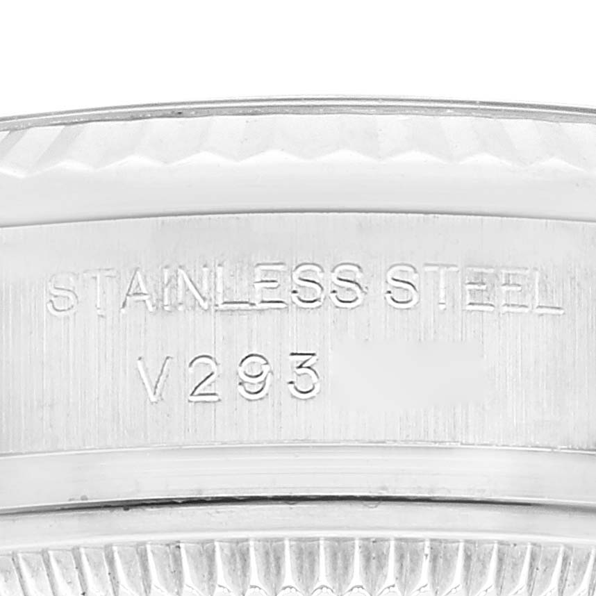 The image shows a close-up of the stainless steel casing and serial number of a Rolex Datejust 179174 Women's Stainless Steel Silver Dial 179174 Women's Stainless Steel Silver Dial watch.