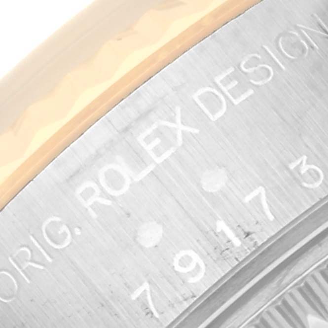 The image shows a close-up of the case back engraving of a Rolex Datejust 79173 Women's Stainless Steel Black Dial 79173 Women's Stainless Steel Black Dial watch.