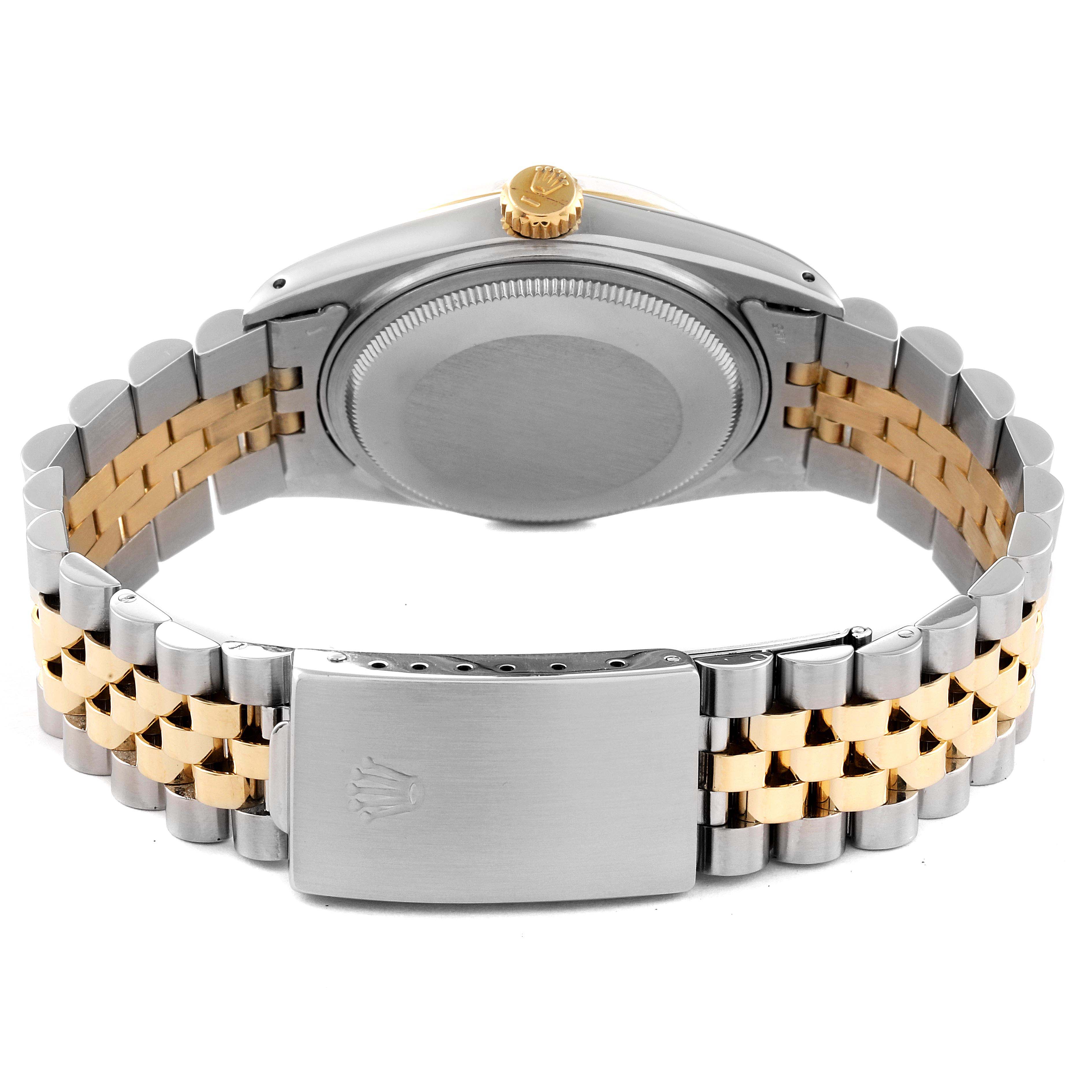 The image shows the back and clasp of the Vintage Collection Rolex watch, highlighting its two-tone metal bracelet.
