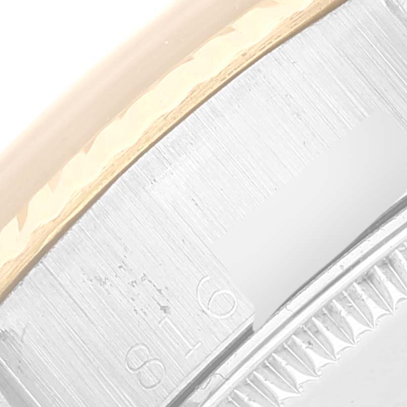 The image shows a close-up angle of the bezel and case edge of a Rolex Datejust 6917 Women's Steel and Gold (two tone) Champagne Dial 6917 Women's Steel and Gold (two tone) Champagne Dial watch.