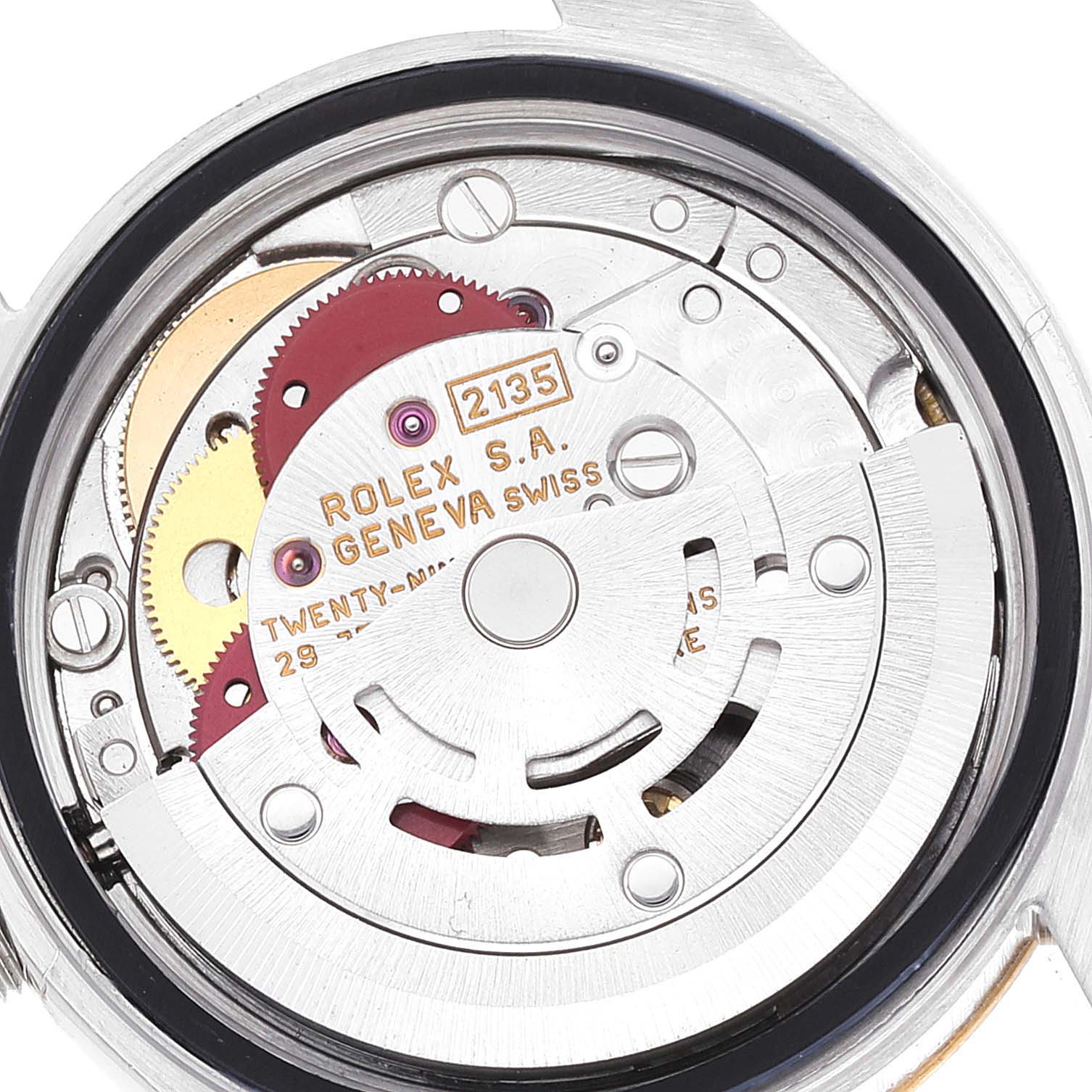 This image shows the internal mechanism of a Rolex Datejust 69173 Women's Steel and Gold (two tone) Champagne Dial 69173 Women's Steel and Gold (two tone) Champagne Dial watch, revealing gears and the rotor from a top-down angle.