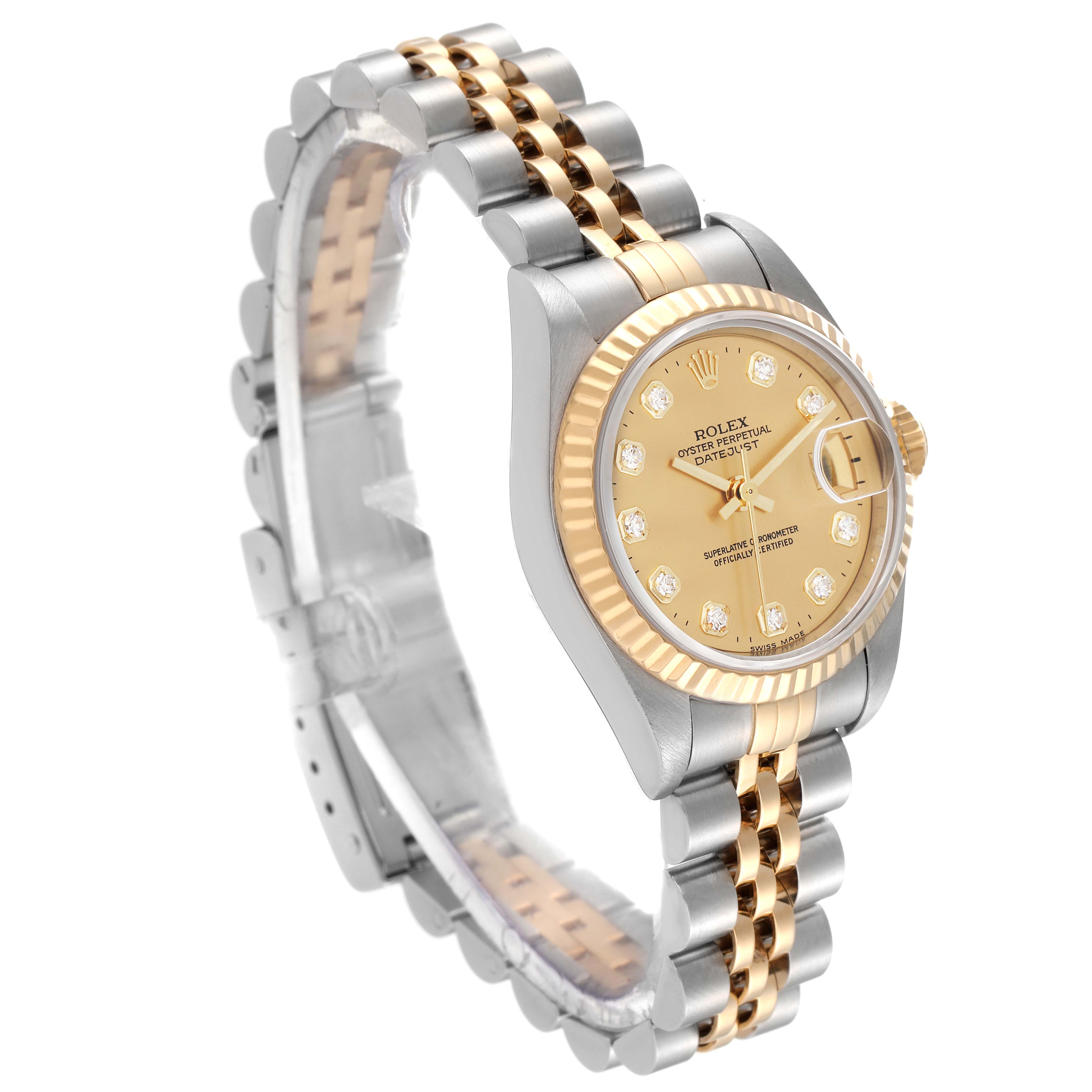 The Rolex Datejust 79173 Women's Steel and Gold (two tone) Champagne Dial 79173 Women's Steel and Gold (two tone) Champagne Dial watch is shown at a slight angle, highlighting its gold and silver linked bracelet, fluted bezel, and diamond-accented dial.