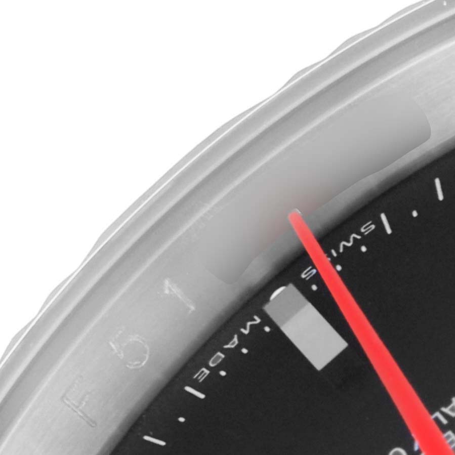 The image shows a close-up of the dial and bezel of a Rolex Turn-o-Graph 116264 Men's Stainless Steel Black Dial 116264 Men's Stainless Steel Black Dial watch, focusing on a red seconds hand and part of the chapter ring.