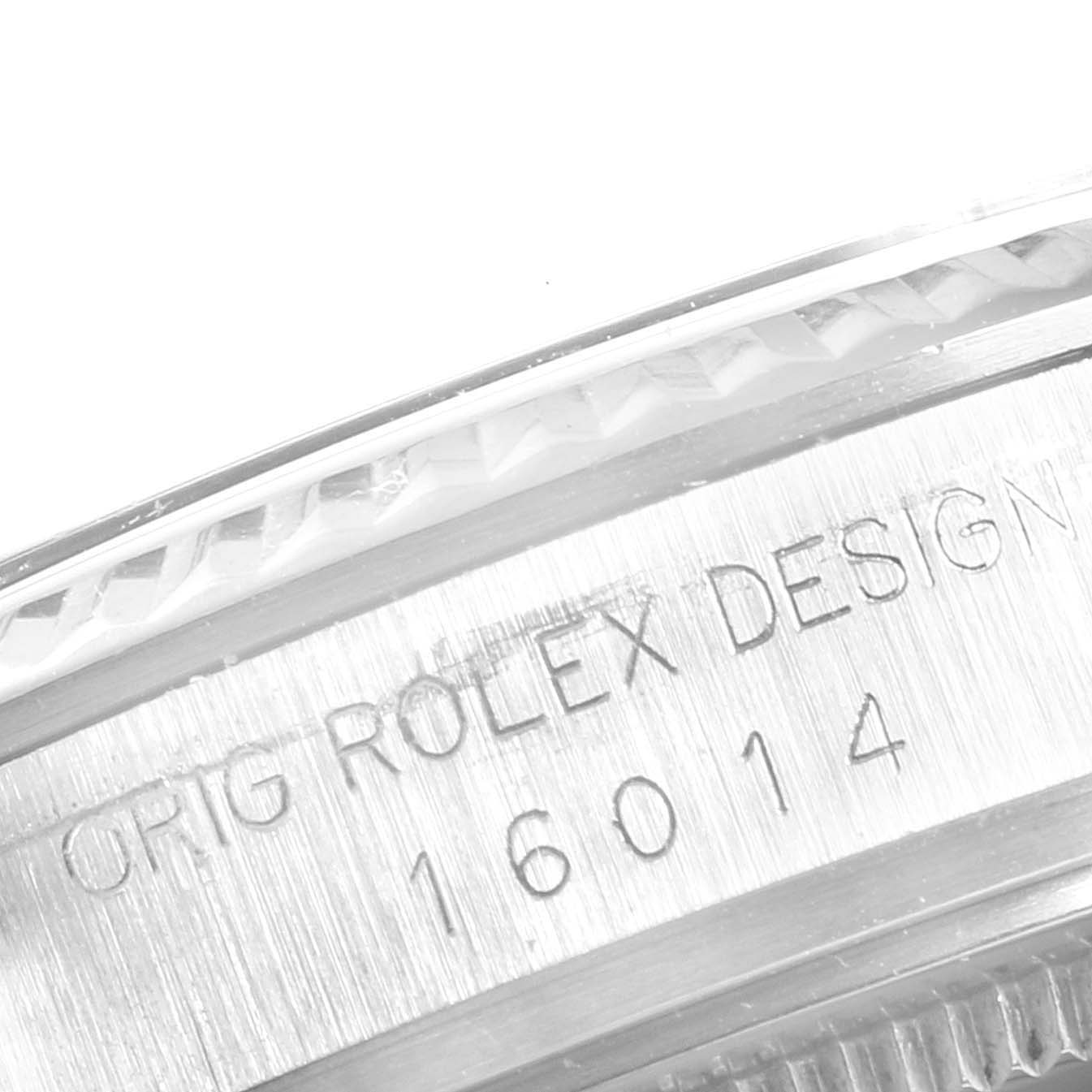 The image shows a close-up of the side of a Rolex Vintage Collection 16014 Men's Stainless Steel Grey Dial 16014 Men's Stainless Steel Grey Dial watch, focusing on the engraved model number "16014."