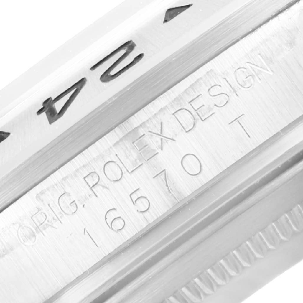 The image shows a close-up of the bezel and case of a Rolex Explorer 16570 Men's Stainless Steel Black Dial 16570 Men's Stainless Steel Black Dial watch, highlighting the etched model number "16570."