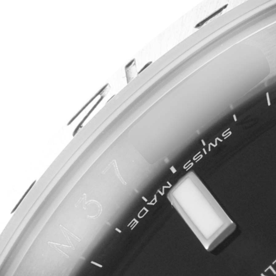 The image shows a close-up of the bezel and part of the dial displaying "Swiss Made" on the Rolex Explorer 16570 Men's Stainless Steel Black Dial 16570 Men's Stainless Steel Black Dial model watch.