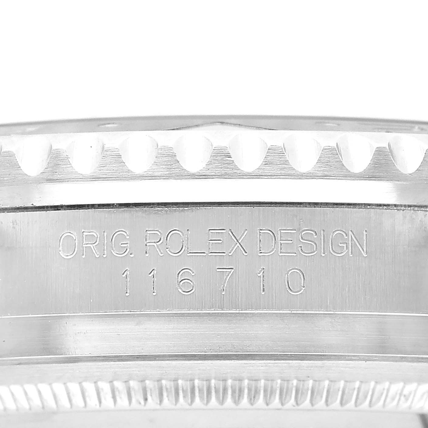 The image shows a close-up side view of the Rolex GMT-Master 116710LN Men's Stainless Steel Black Dial's casing with engraved details.