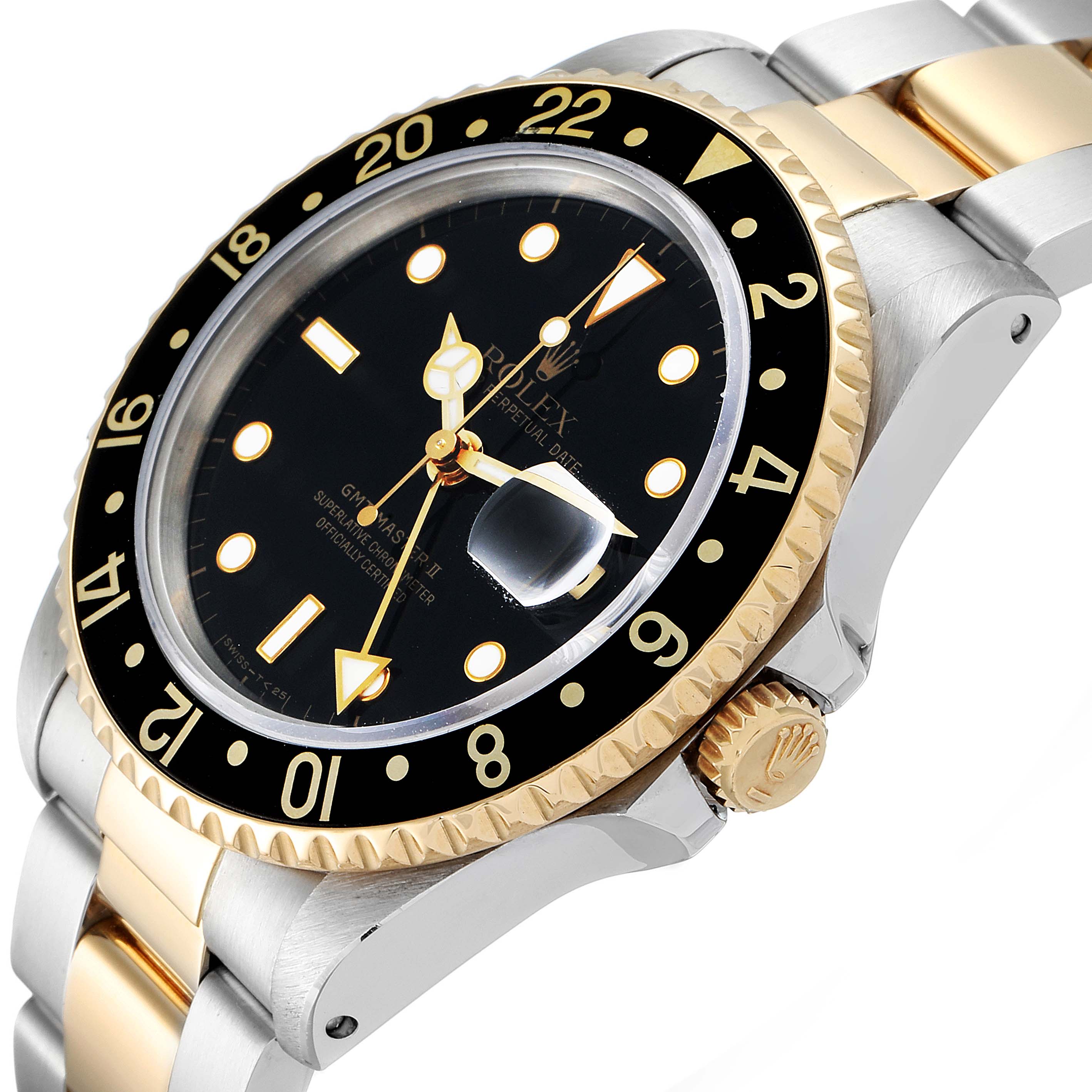 This is a close-up, angled view of a Rolex GMT-Master 16713 Men's Steel and Gold (two tone) Black Dial 16713 Men's Steel and Gold (two tone) Black Dial watch showcasing the bezel, dial, and part of the bracelet.