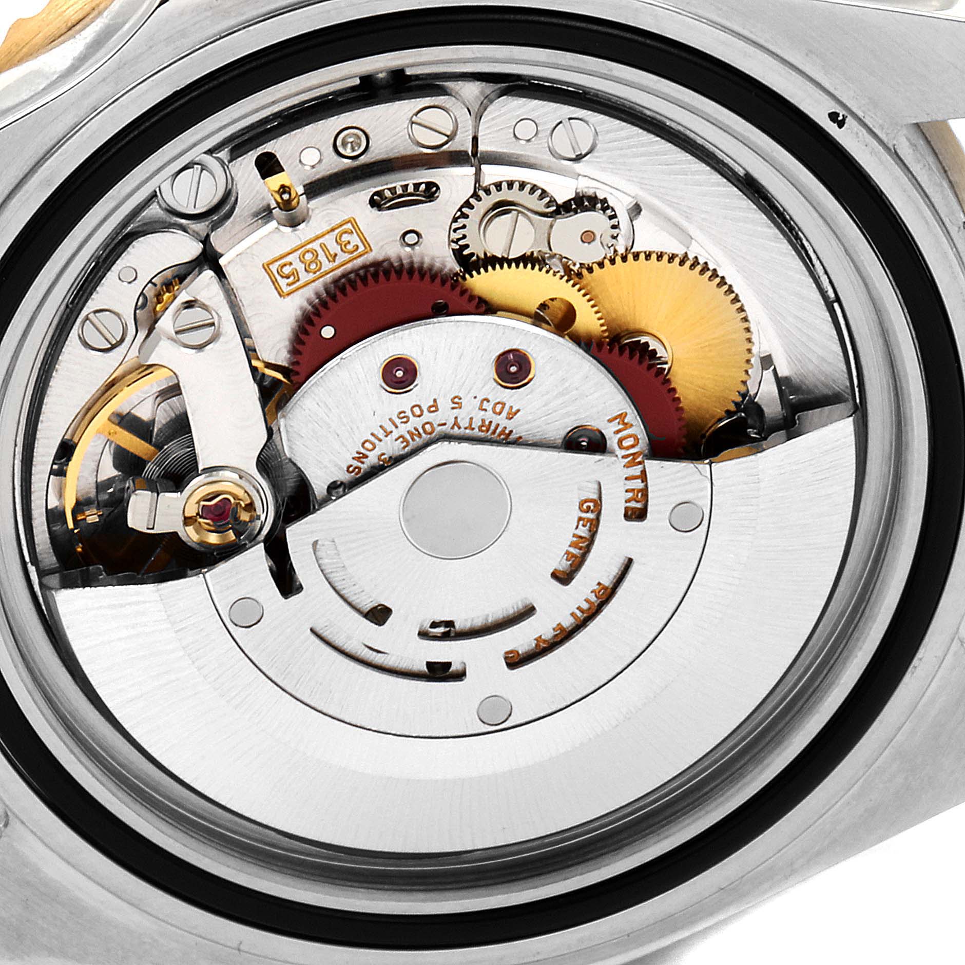 This image shows a close-up of the movement mechanism inside a Rolex GMT-Master 16713 Men's Steel and Gold (two tone) Black Dial 16713 Men's Steel and Gold (two tone) Black Dial watch.