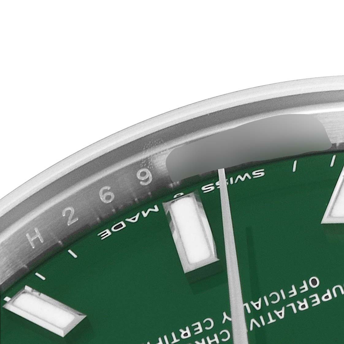 This image shows a close-up of the dial and part of the bezel of a Mid-Size Rolex watch.