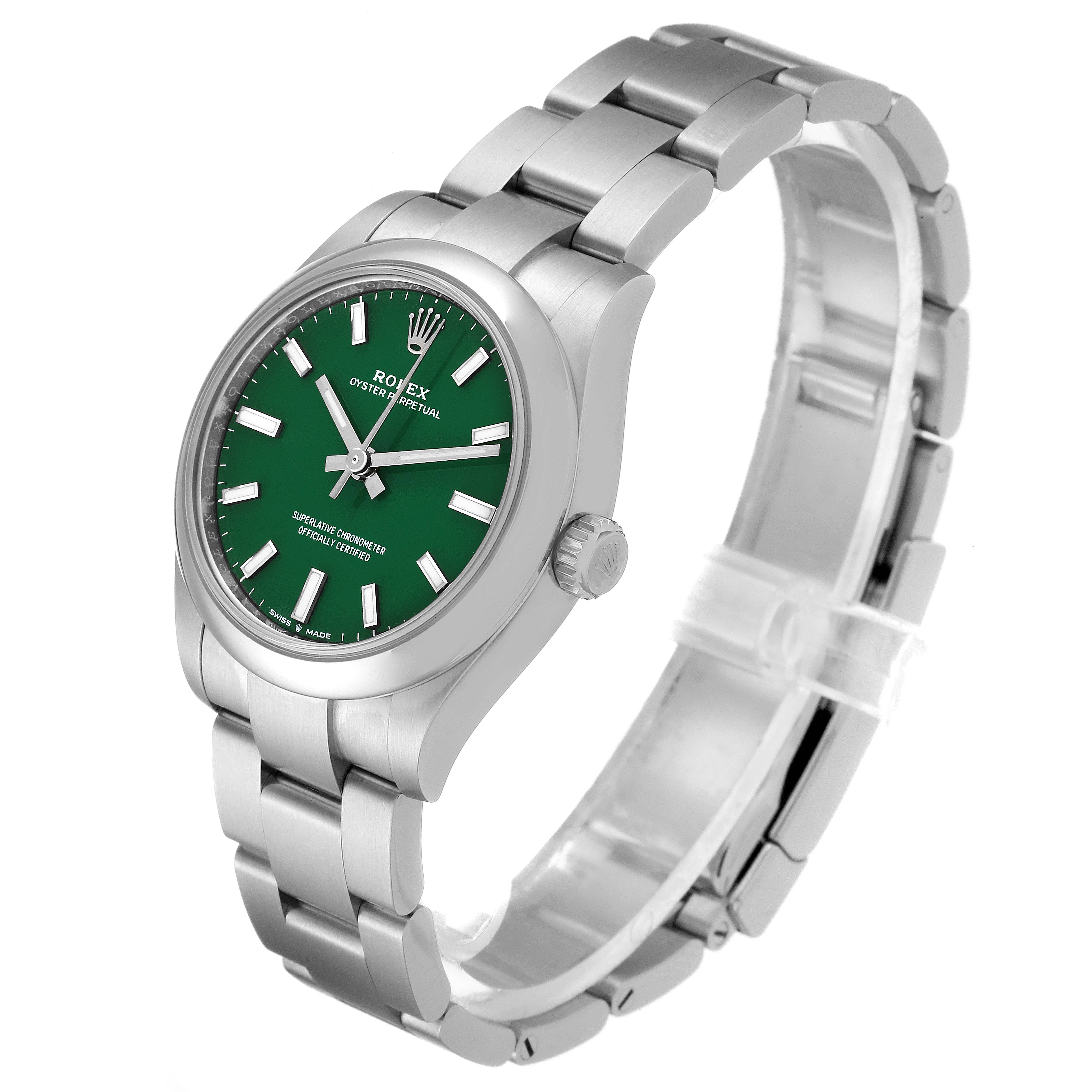 This image shows a Rolex Mid-Size 277200 Women's Stainless Steel Green Dial 277200 Women's Stainless Steel Green Dial Oyster Perpetual watch from a 3/4 angle, highlighting the green dial, bracelet, and crown.