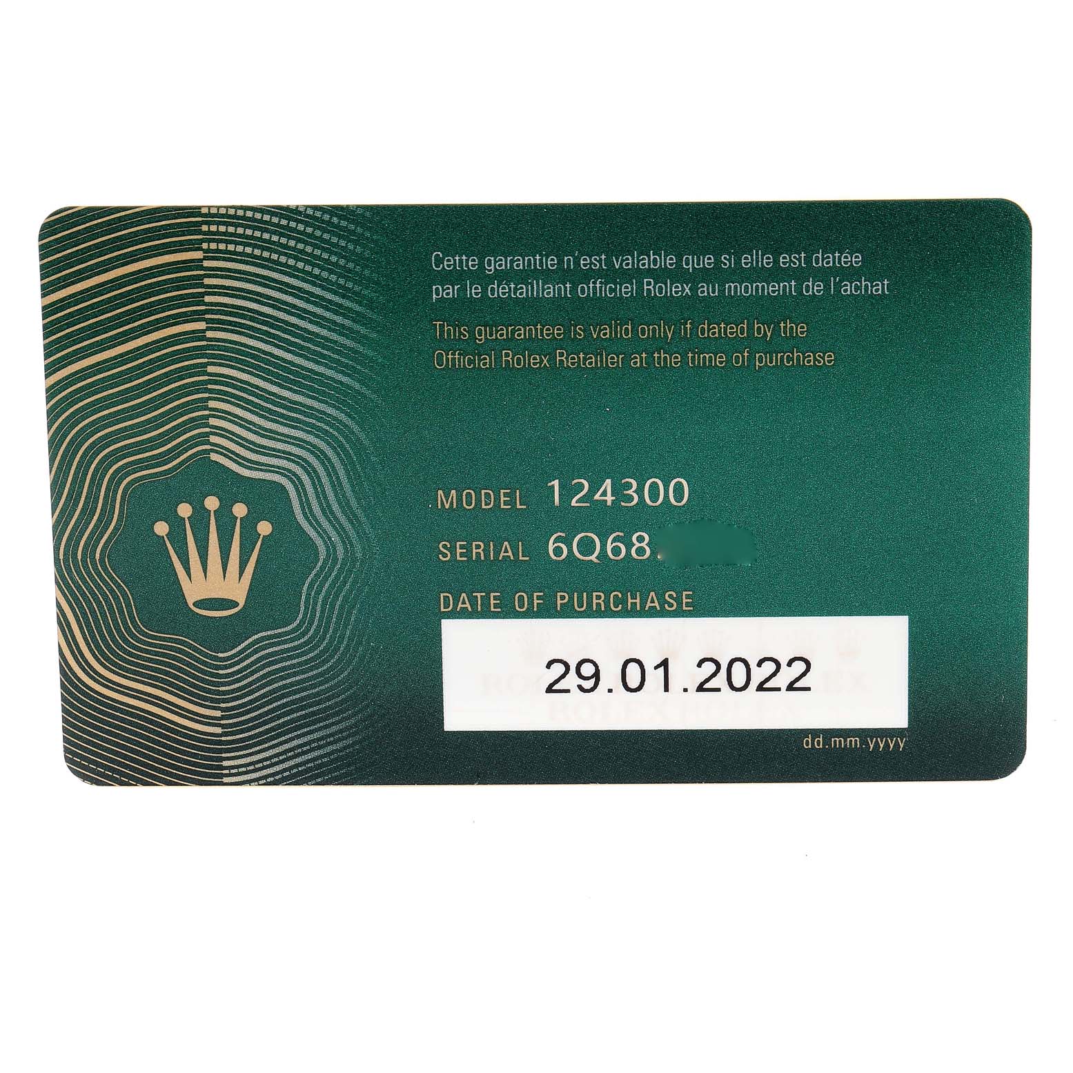 This image shows the warranty card for the Rolex Oyster Perpetual 124300 Men
s Stainless Steel Blue Dial 124300 Men
s Stainless Steel Blue Dial model 124300, including purchase date and serial number.