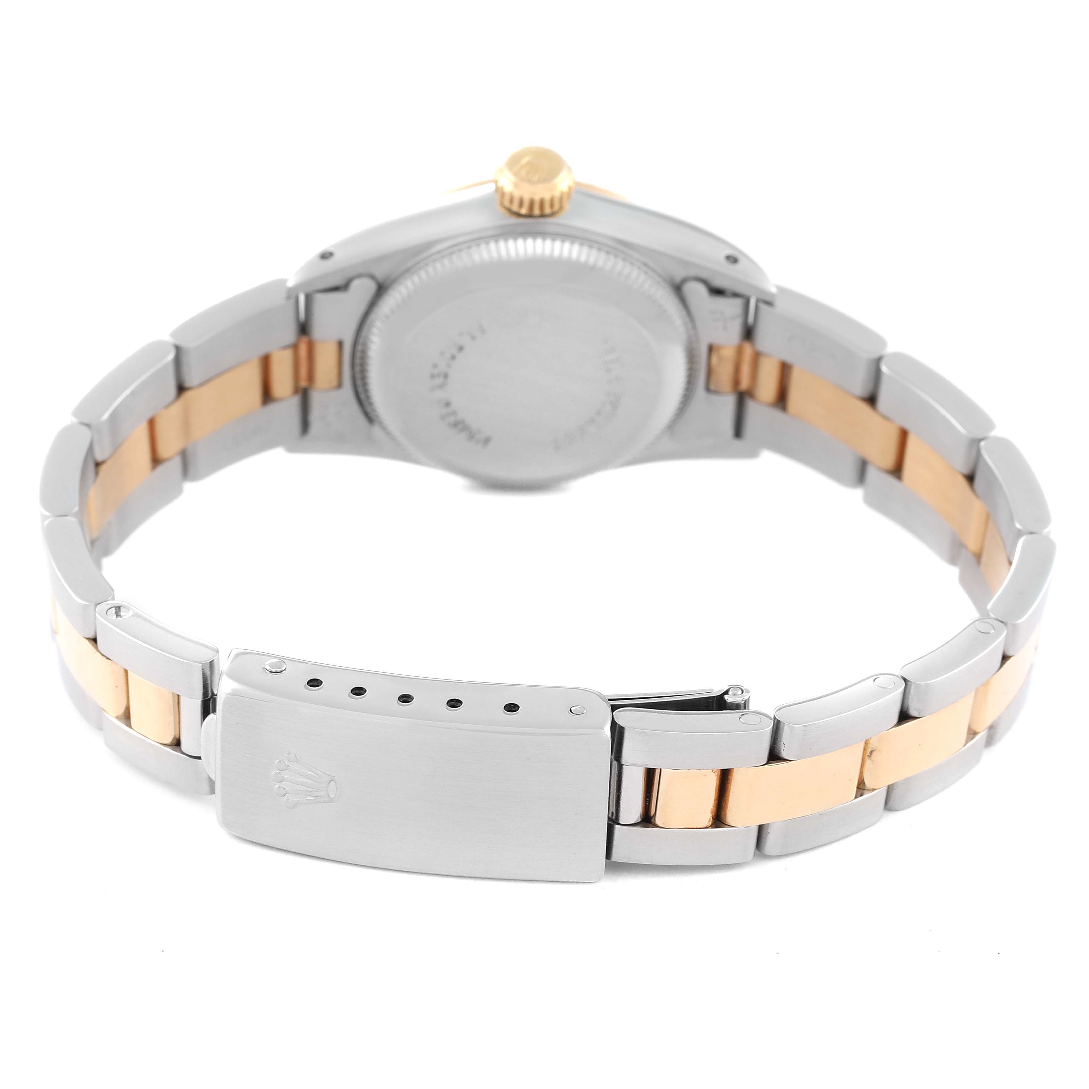 The image shows the back side of a Rolex Oyster Perpetual 67193 Women's Steel and Gold (two tone) Champagne Dial 67193 Women's Steel and Gold (two tone) Champagne Dial watch, highlighting the clasp and bracelet.