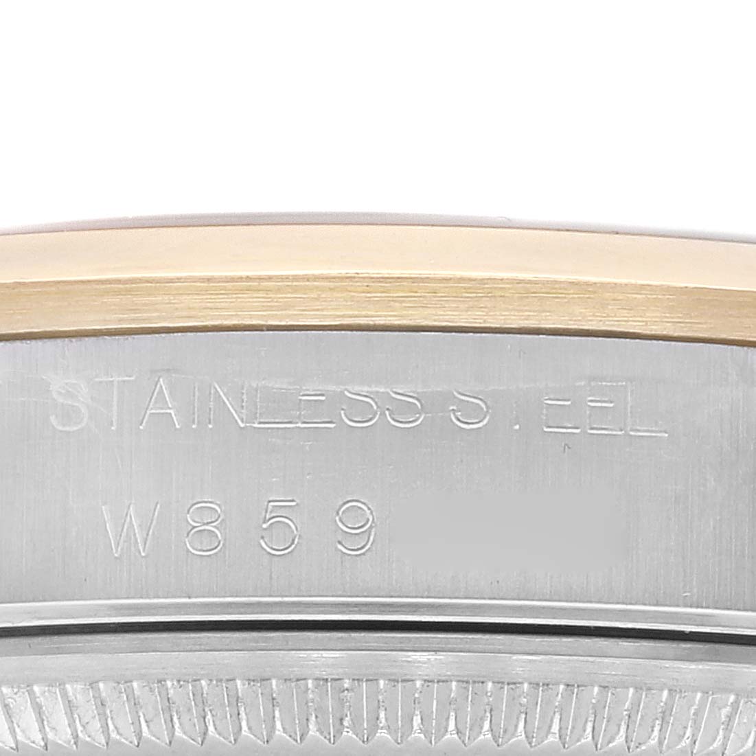 This image shows a close-up of the watch case side of a Rolex Oyster Perpetual 14203 Men's Steel and Gold (two tone) Grey Dial 14203 Men's Steel and Gold (two tone) Grey Dial, highlighting the stainless steel and serial number engraving.