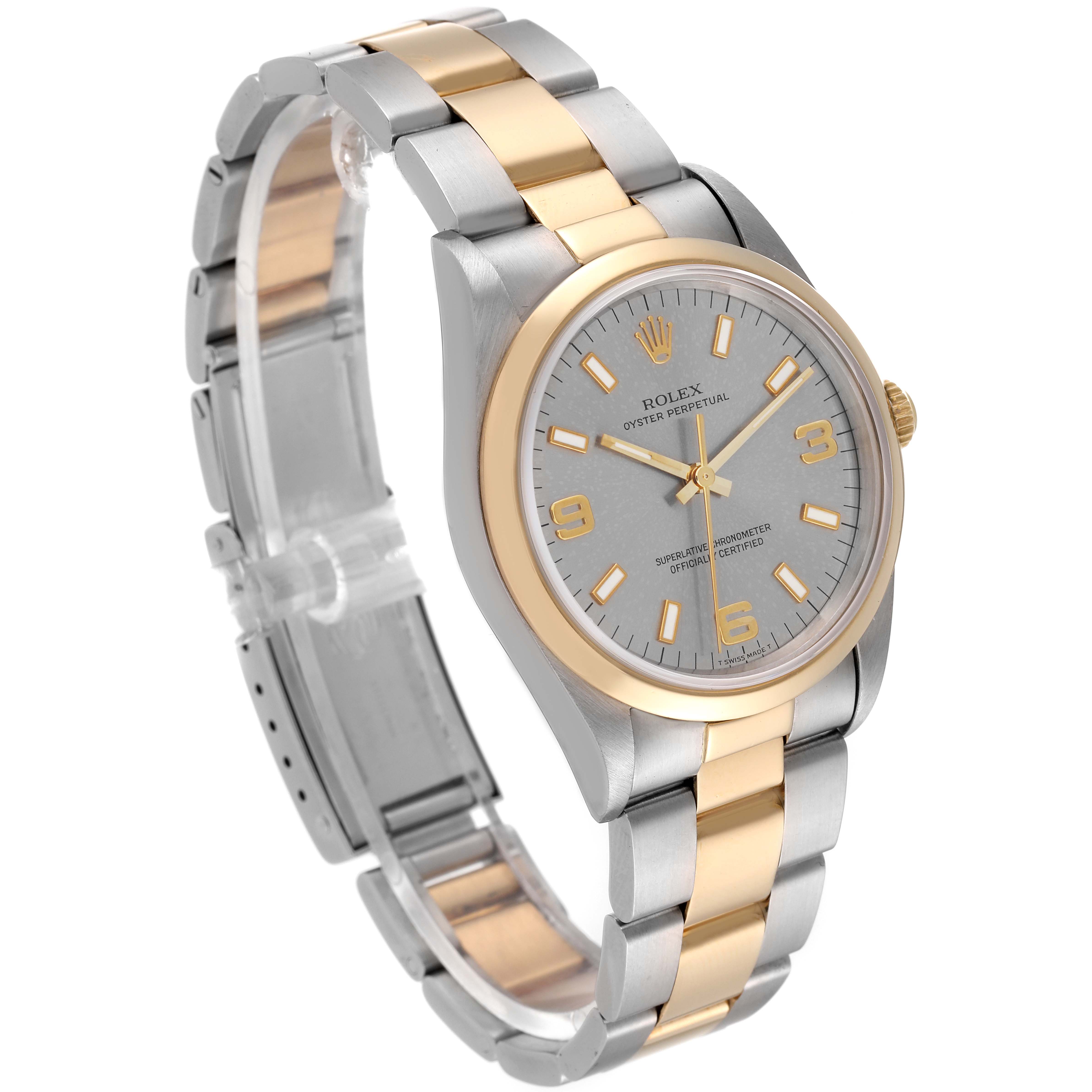 The image shows a side angle of the Rolex Oyster Perpetual 14203 Men's Steel and Gold (two tone) Grey Dial 14203 Men's Steel and Gold (two tone) Grey Dial watch, highlighting its gold and silver bracelet and face.