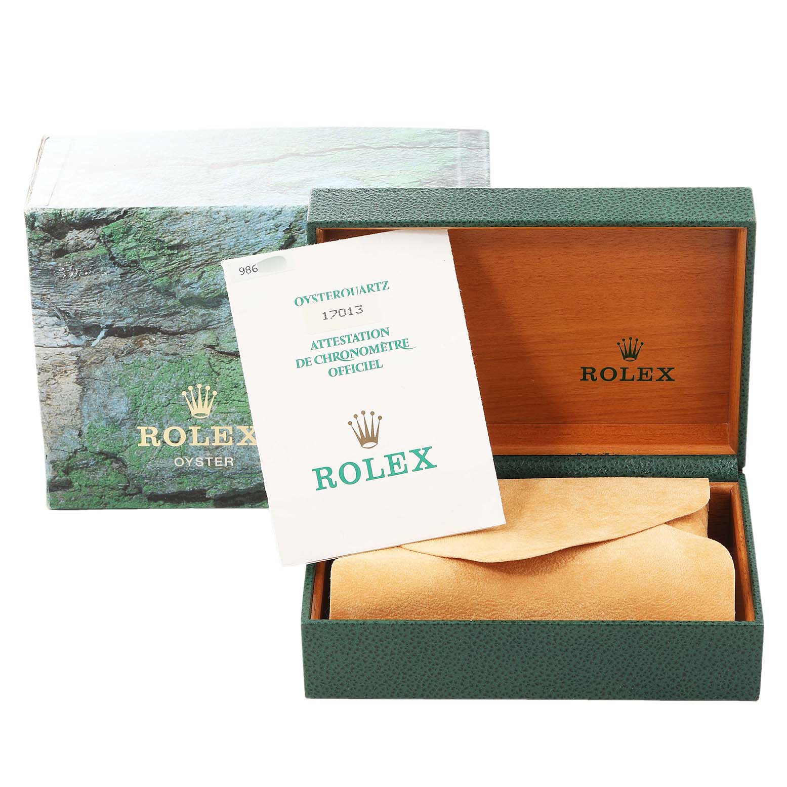 The image shows the packaging and documentation for a Rolex Oysterquartz 17013 Men's Steel and Gold (two tone) Champagne Dial 17013 Men's Steel and Gold (two tone) Champagne Dial model, including the box and official chronometer certification.