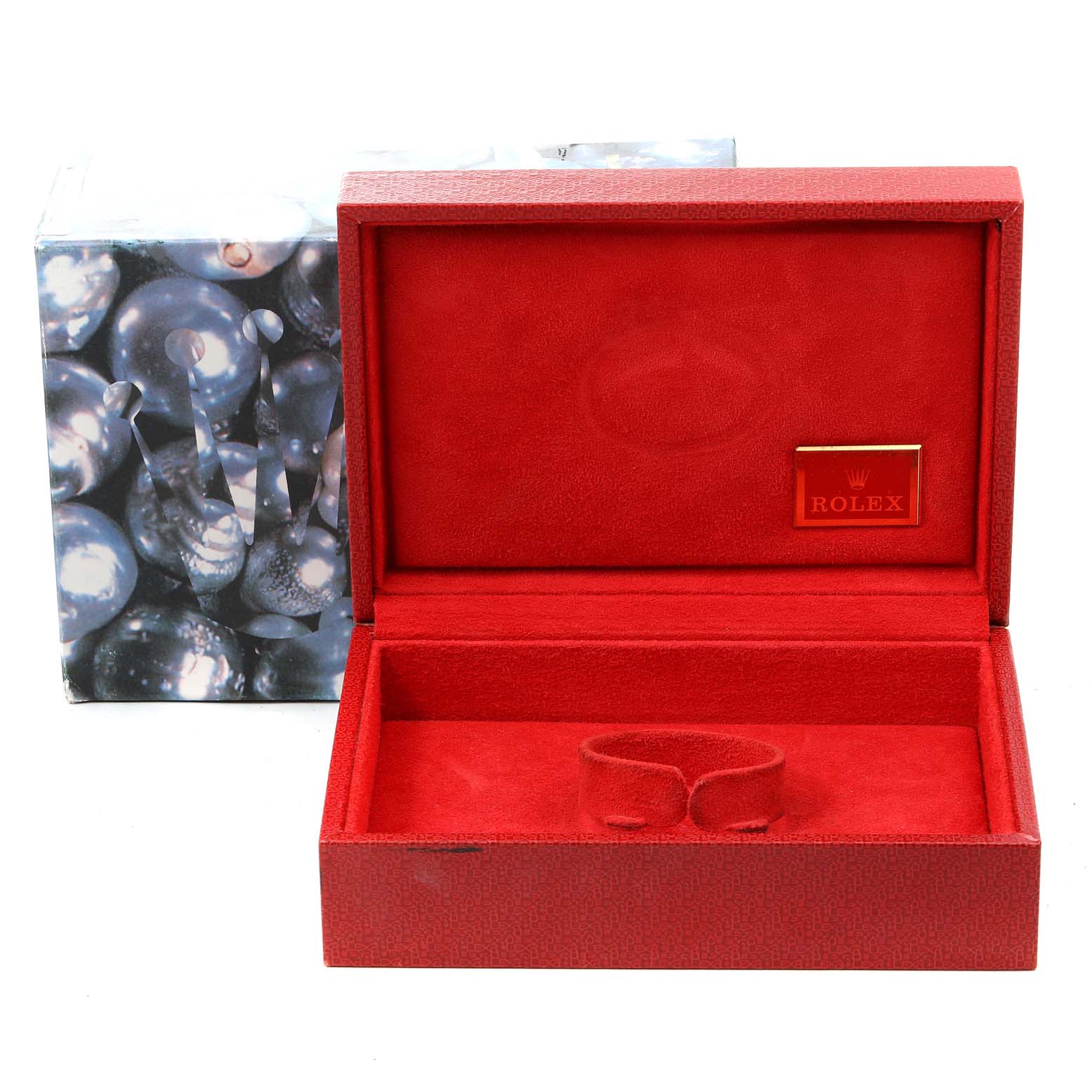 The image shows an empty, red Rolex watch case for the President model, with a hinged top and an enclosed slot for the watch.