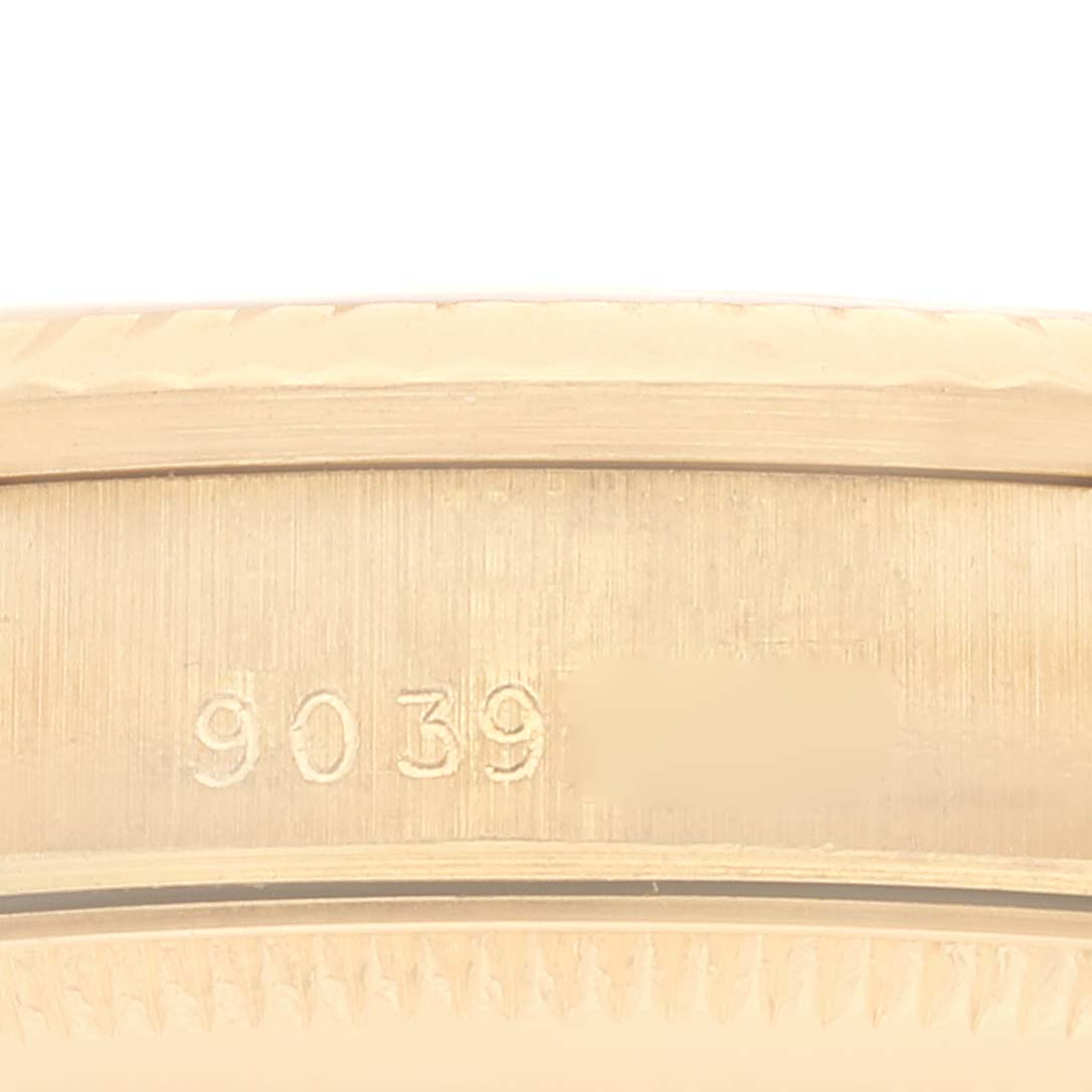 This image shows a close-up of the serial number engraving on the side of a Rolex President 68278 Women
s Yellow Gold Champagne Dial 68278 Women
s Yellow Gold Champagne Dial model watch.