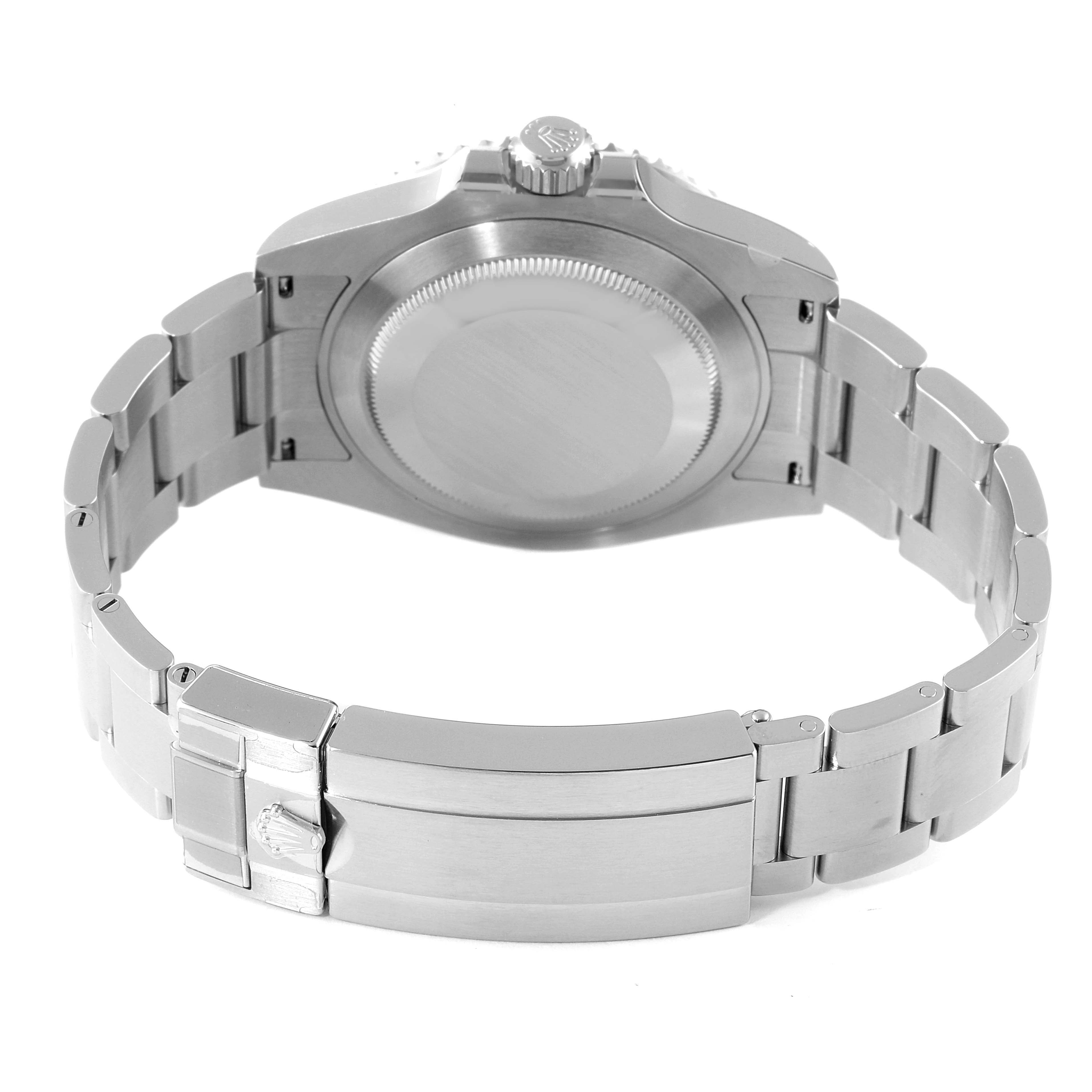 This image shows the back view of a Rolex Submariner 126610LV Men's Stainless Steel Black Dial 126610LV Men's Stainless Steel Black Dial watch, highlighting its case back and bracelet with the deployment clasp.