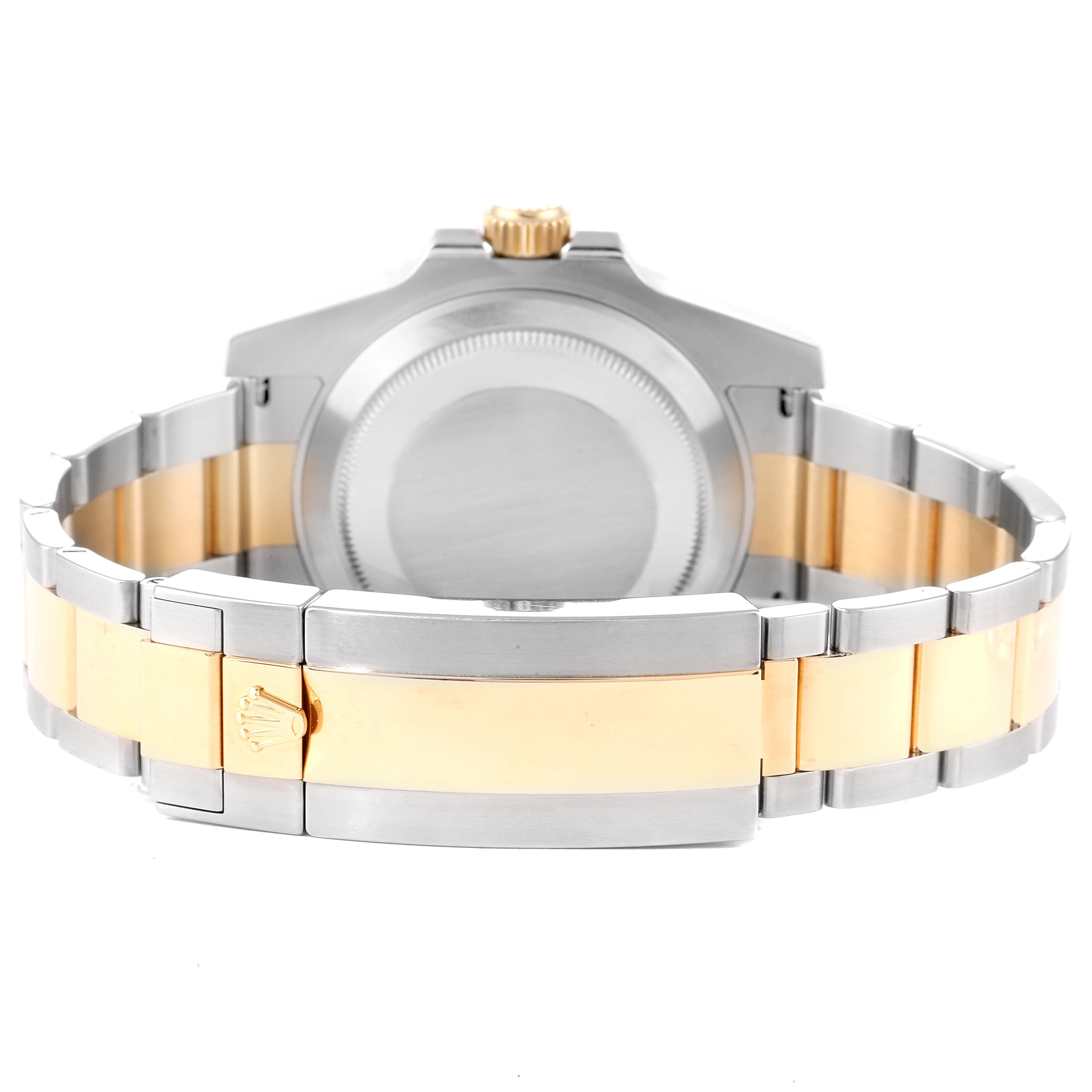 The image shows the back of a Rolex Submariner 116613 Men's Steel and Gold (two tone) Black Dial 116613 Men's Steel and Gold (two tone) Black Dial watch, including the case back, crown, and two-tone bracelet.