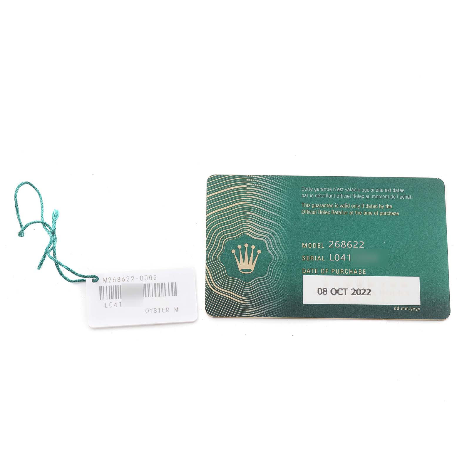 The image shows the warranty card and hang tag for a Rolex Yacht-Master 268622 Men's Stainless Steel Grey Dial 268622 Men's Stainless Steel Grey Dial watch model.