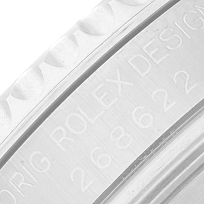 Close-up of the side engraving on a Rolex Yacht-Master 268622 Men's Stainless Steel Grey Dial 268622 Men's Stainless Steel Grey Dial watch, showing part of the bezel and serial number.